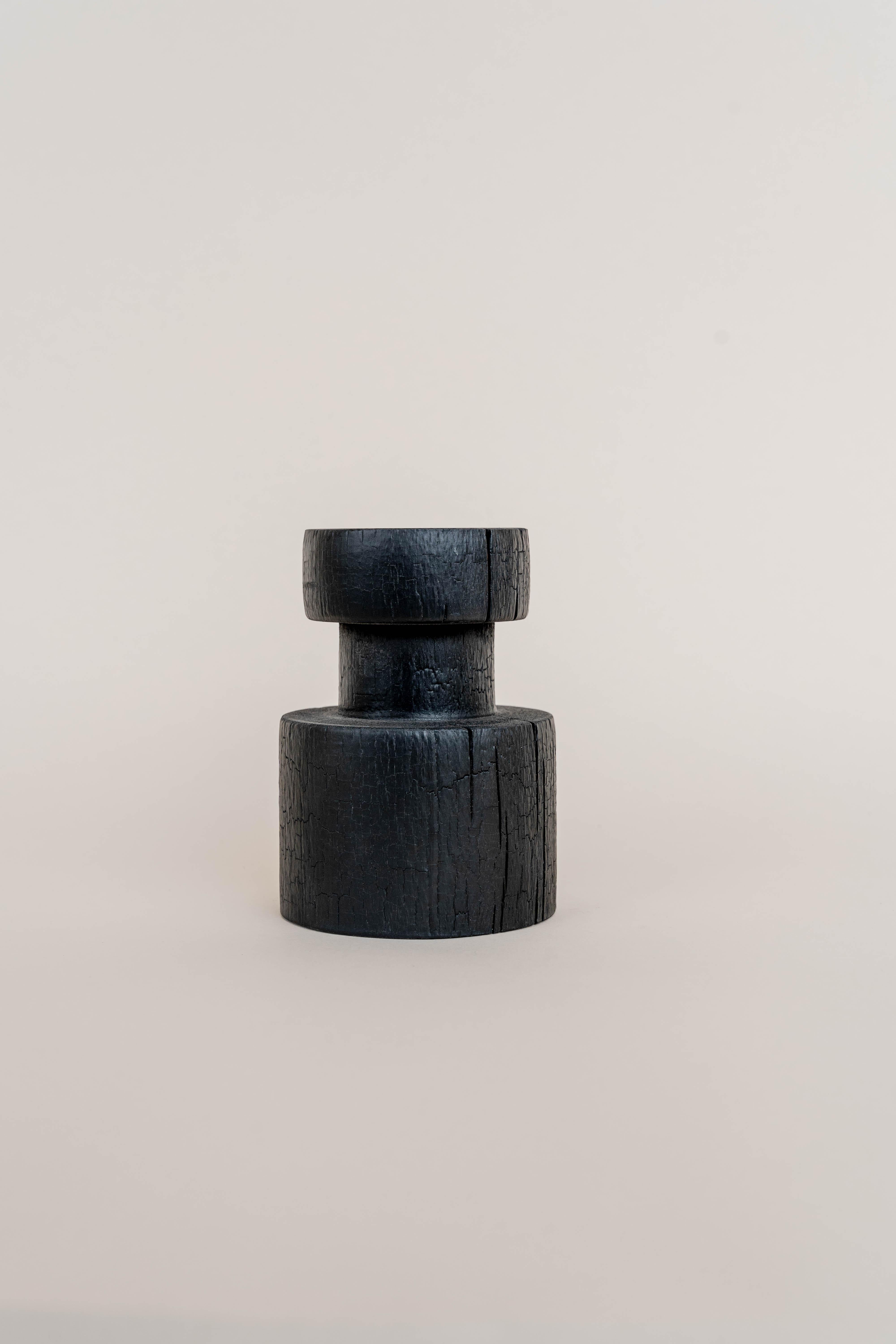 Small revolved burnt beech vase by Daniel Elkayam
One of a kind
Dimensions: D 10 x W 10 x H 12 cm
Materials: beech wood

Daniel Elkayam — Designer 
Jerusalem-born Art-designer and Photographer based in Tel-Aviv. Operating in the field of