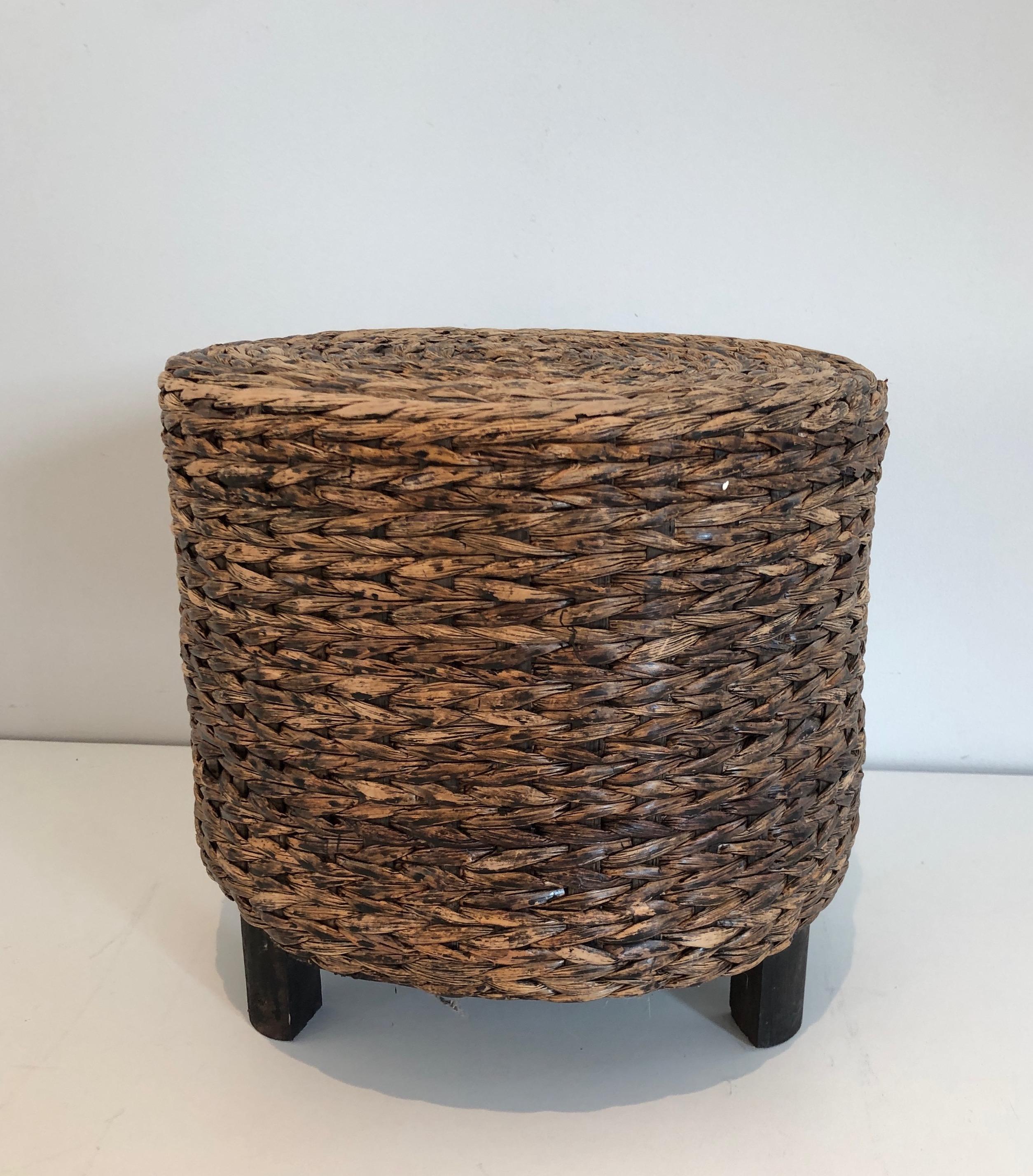 This small stool is made of wood and rope. This is a French work in the style of Adrien Audoux et Frida Minet. French work. Circa 1950