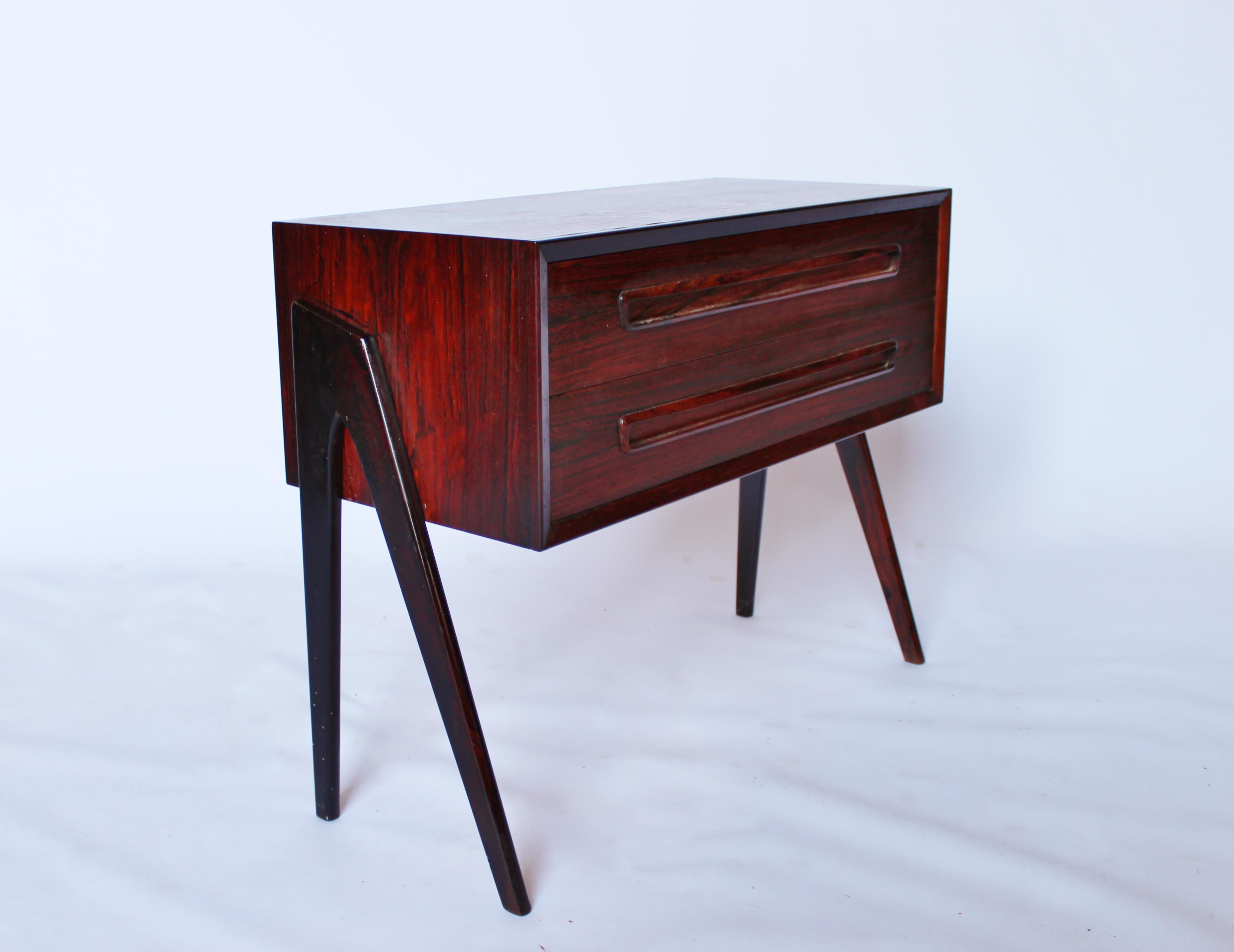 Small rosewood chest of drawers with two drawers of Danish design from the 1960s. The chest is in great vintage condition.