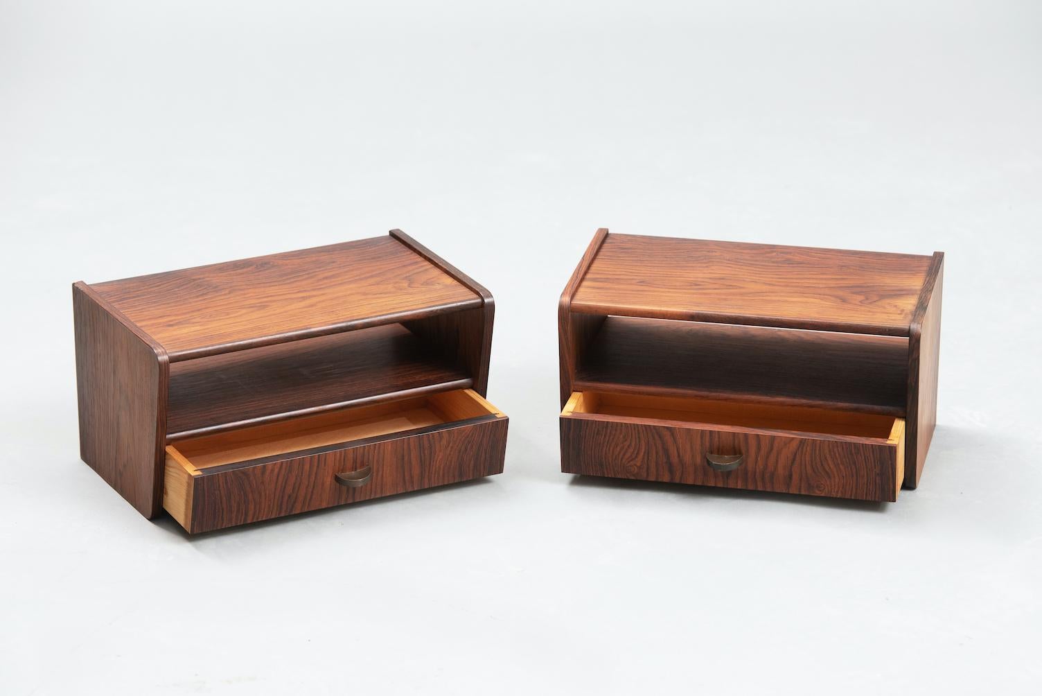 Small rosewood Mid-Century Modern one drawer suspended nightstands.