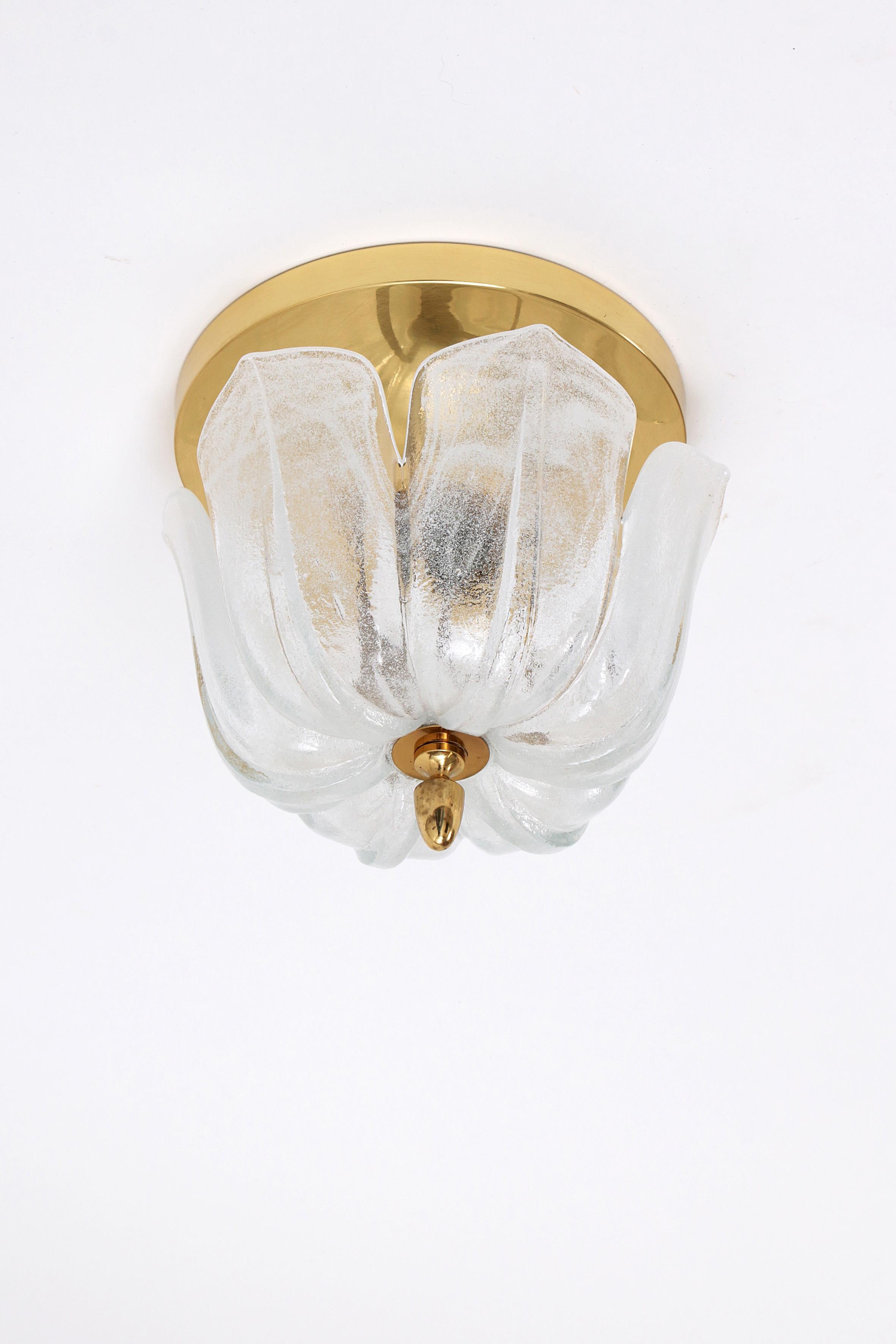 Mid-century modern flower-shaped glass ceiling lamp by Glashutte Limburg (Germany, 1960s). Thick textured glass on a brass metal base. Spreads a beautiful light (see photos). High quality workmanship. Cleaned, rewired and ready to use (compatible in