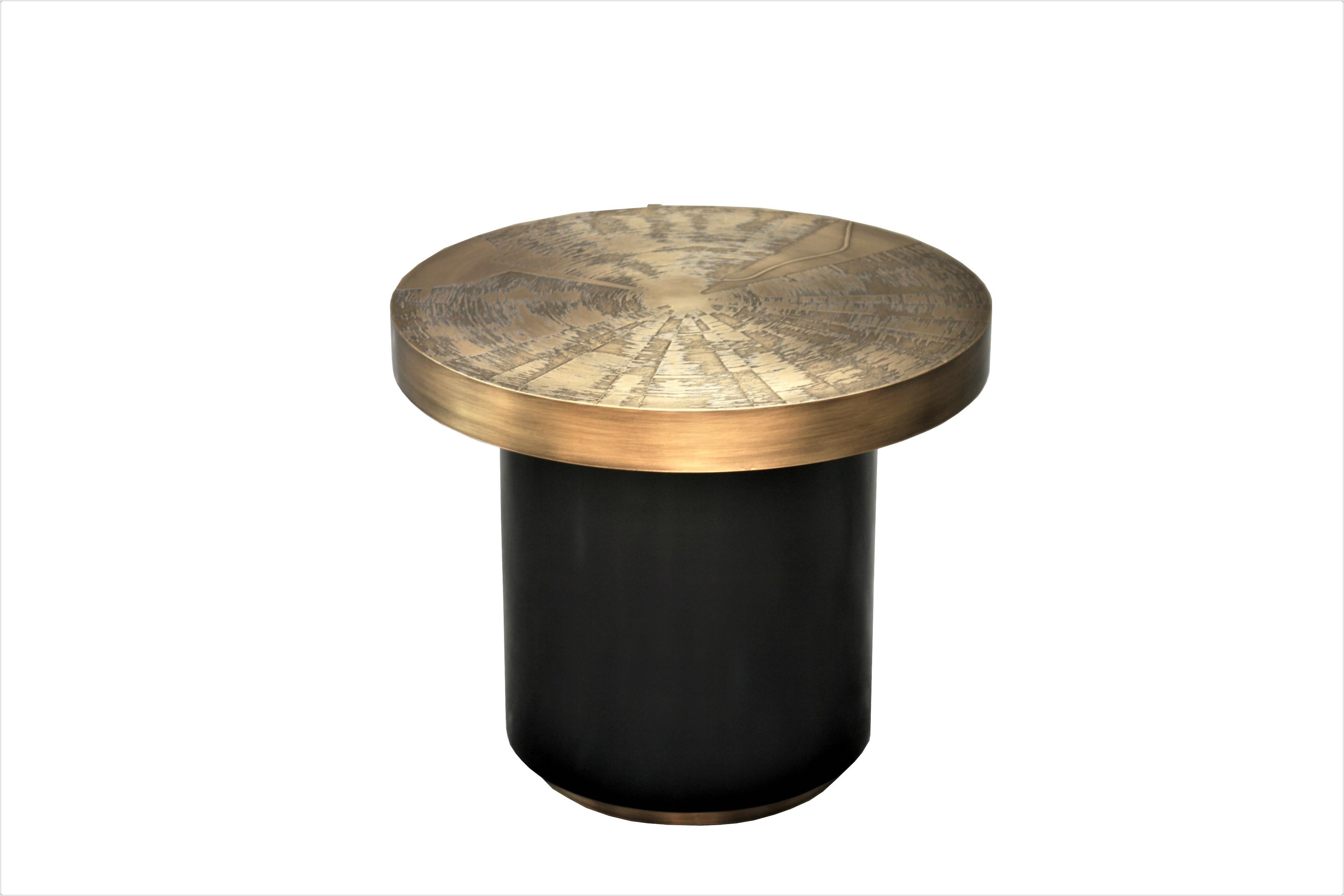 Belgali is a Belgian producer of brass handmade furniture. Mostly acid etched designs, finished with high quality rare semi precious gems. 

Small round coffee table by Belgali acid etched brass has been acid etched and patinated black. Custom
