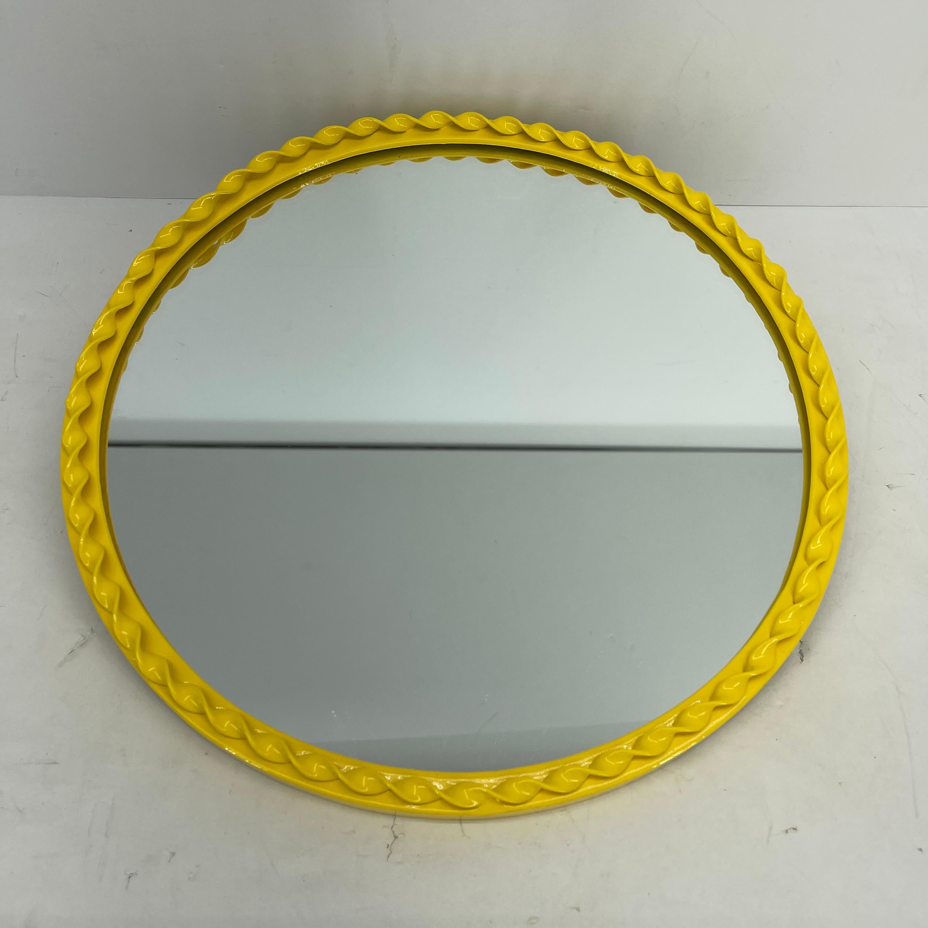 round yellow mirror