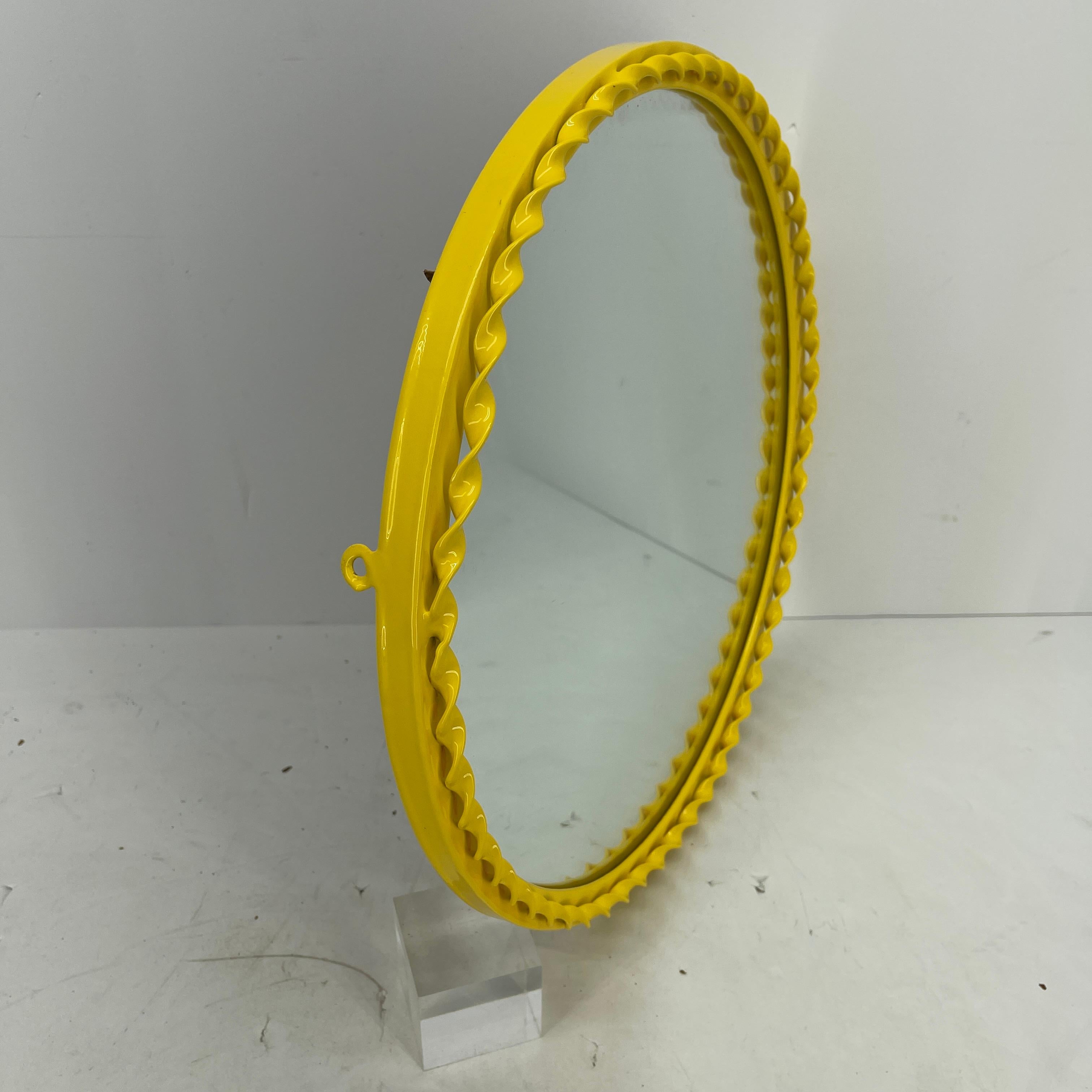 yellow round mirror