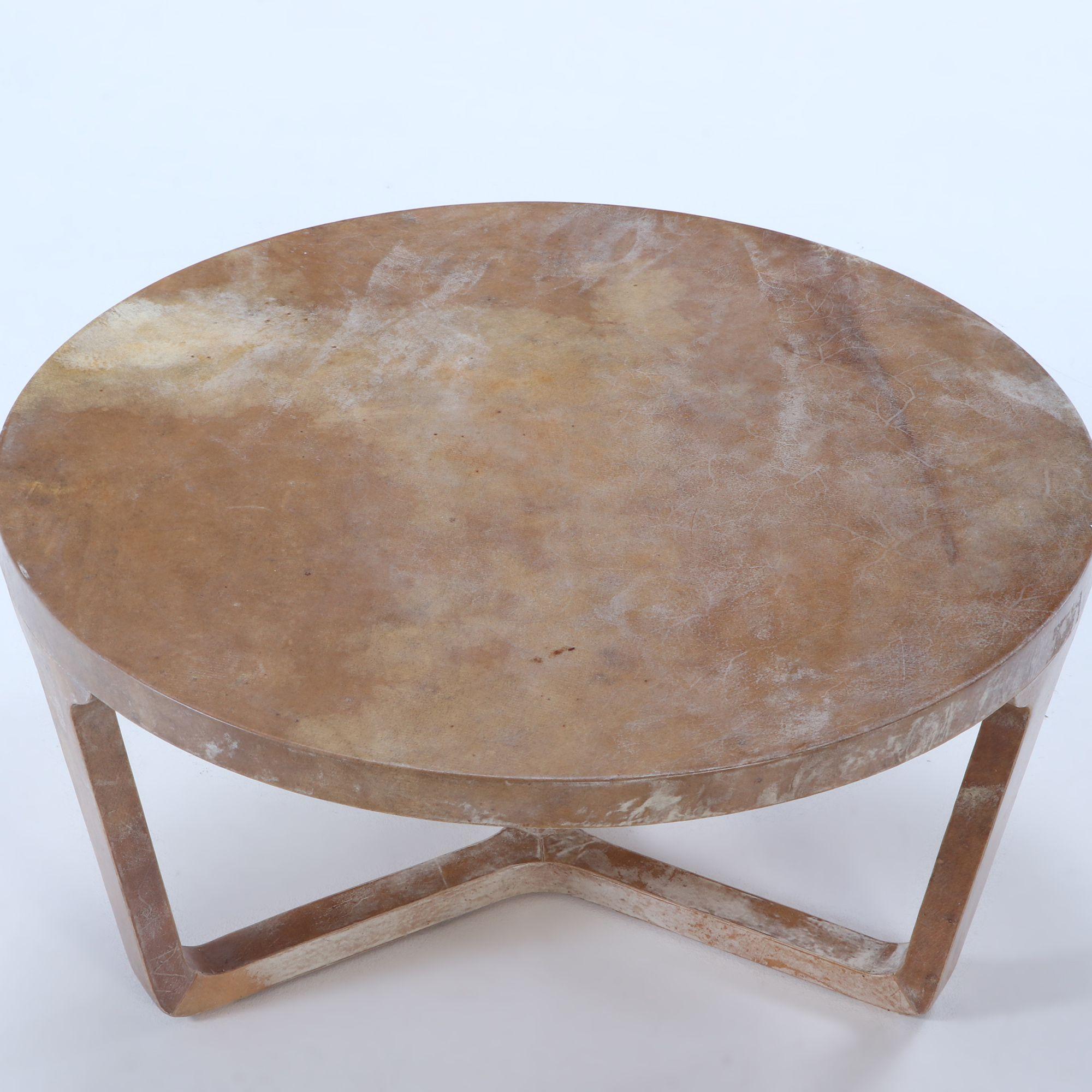 Small round parchment covered coffee table made in our workshops. Custom sizes available.