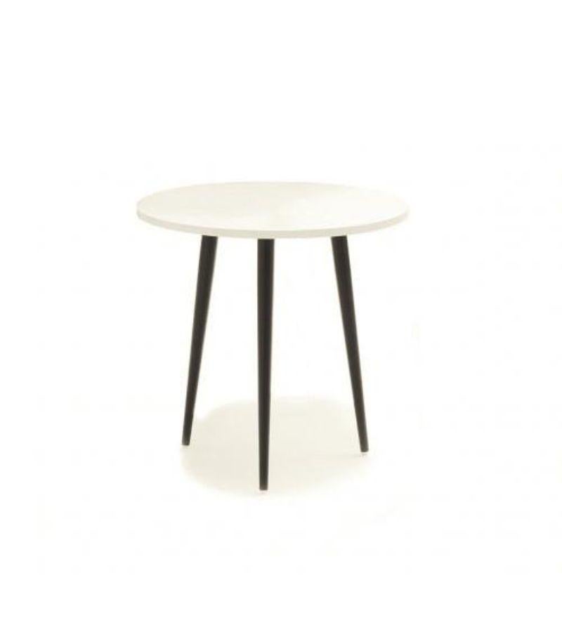 Small round Soho side table by Coedition Studio
Materials: Round pedestal table, black or white or burgundy lacquered top on MDF. Black lacquered conical metal base.
Dimensions: Diameter 40 x 40 cm
Available in different sizes and shapes, and in