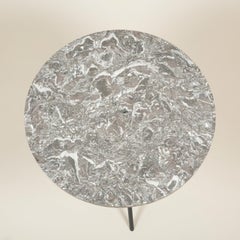 Small Round Table with a Cast Iron Tripod Base and a Figured Grey Marble Top