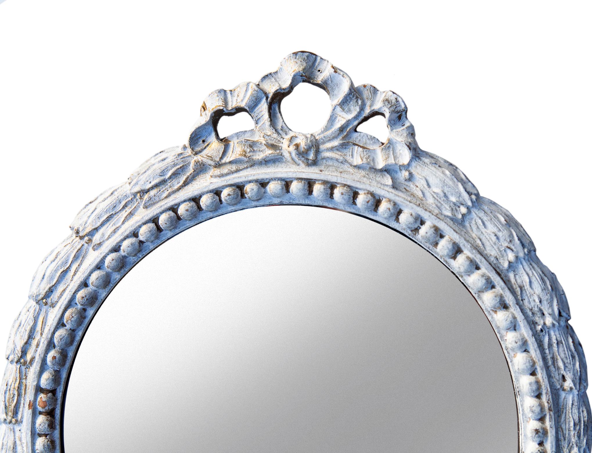 Joli petit miroir rond avec couronne de laurier et de récifs. Nouveau verre miroir et support en feutre.