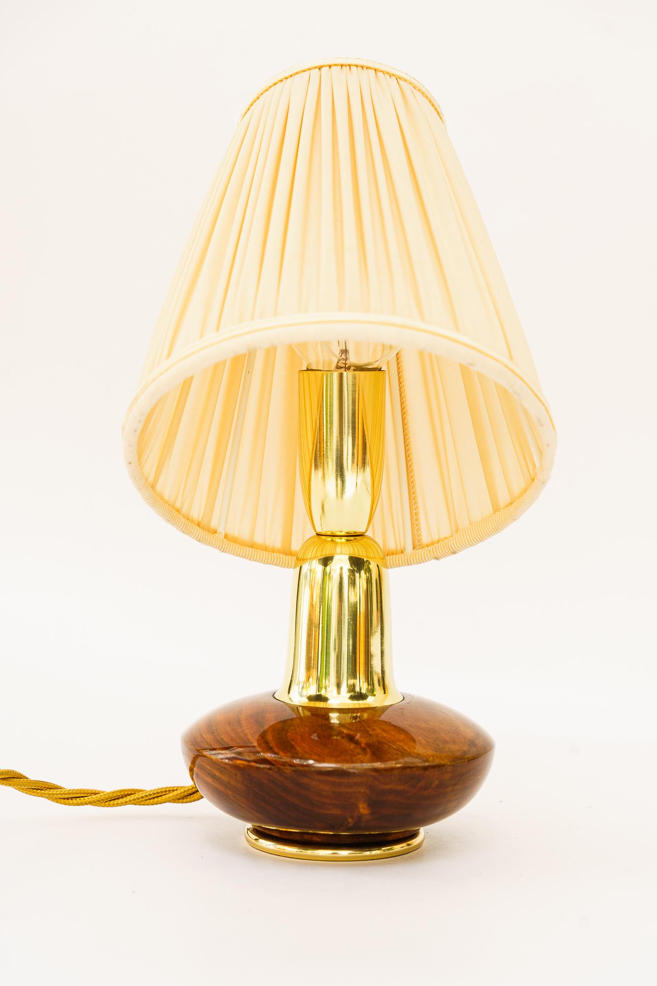 Mid-Century Modern Small Rupert Nikoll wood table lamp with fabric shade around 1950s For Sale