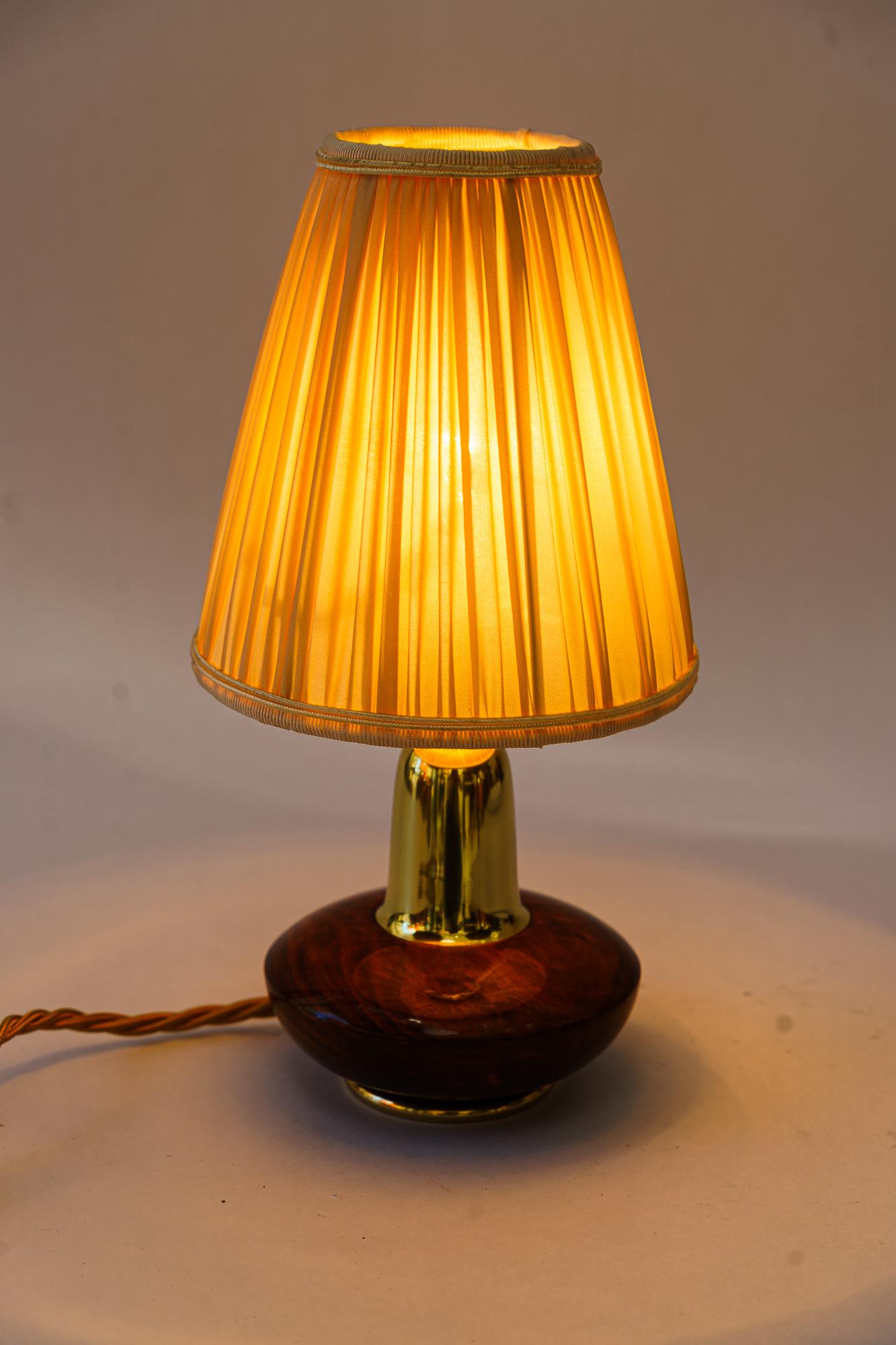 Brass Small Rupert Nikoll wood table lamp with fabric shade around 1950s For Sale
