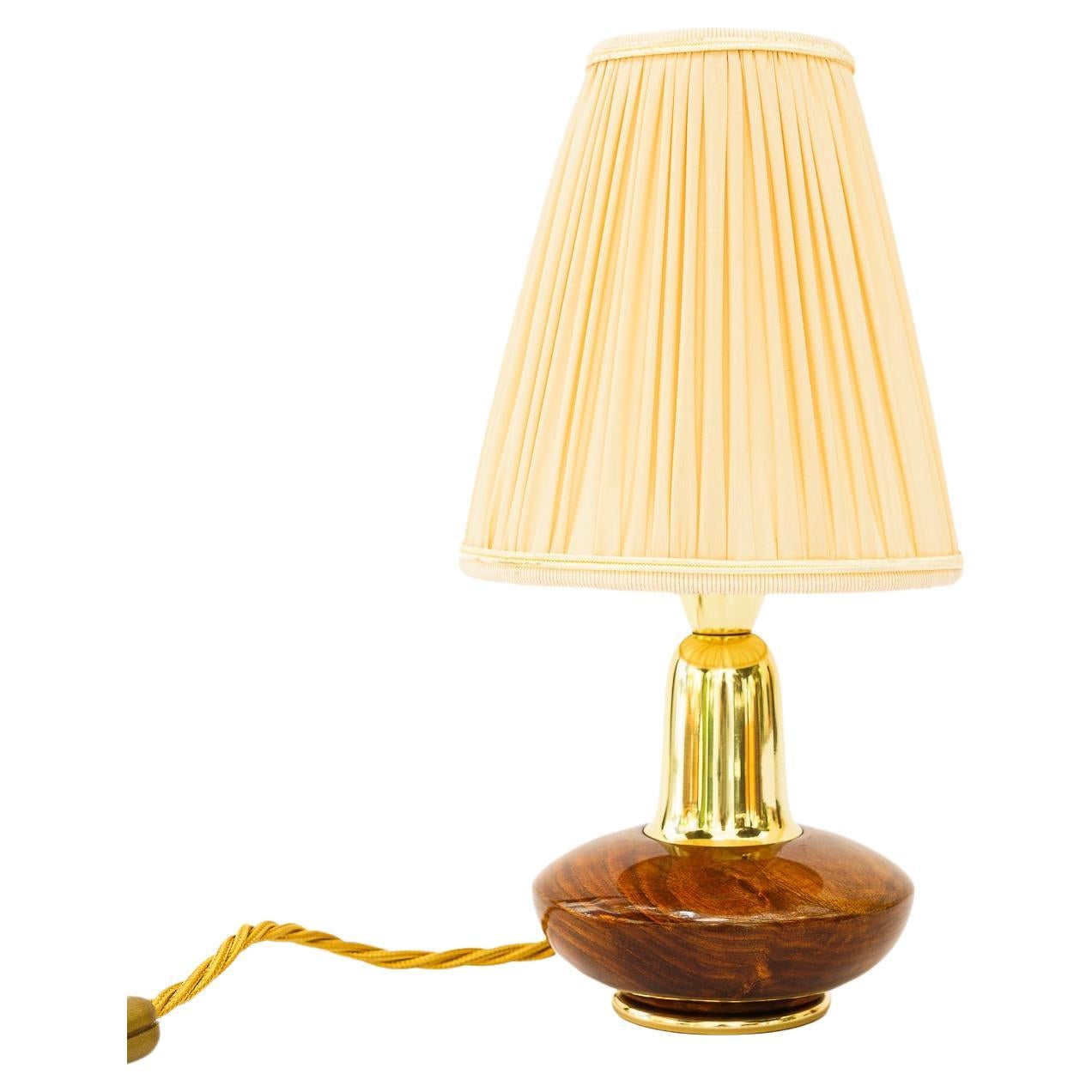 Small Rupert Nikoll wood table lamp with fabric shade around 1950s For Sale