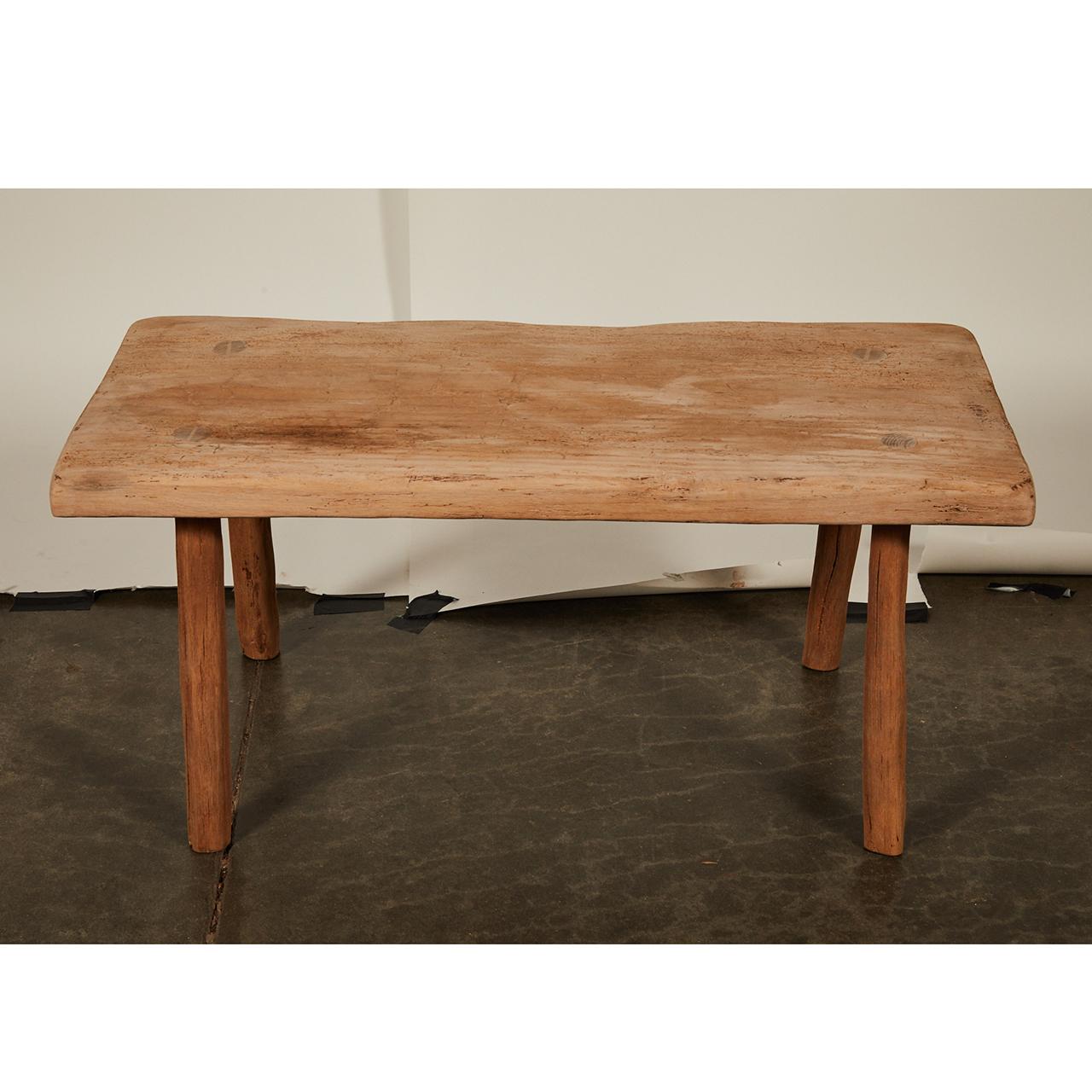 small rustic wood bench