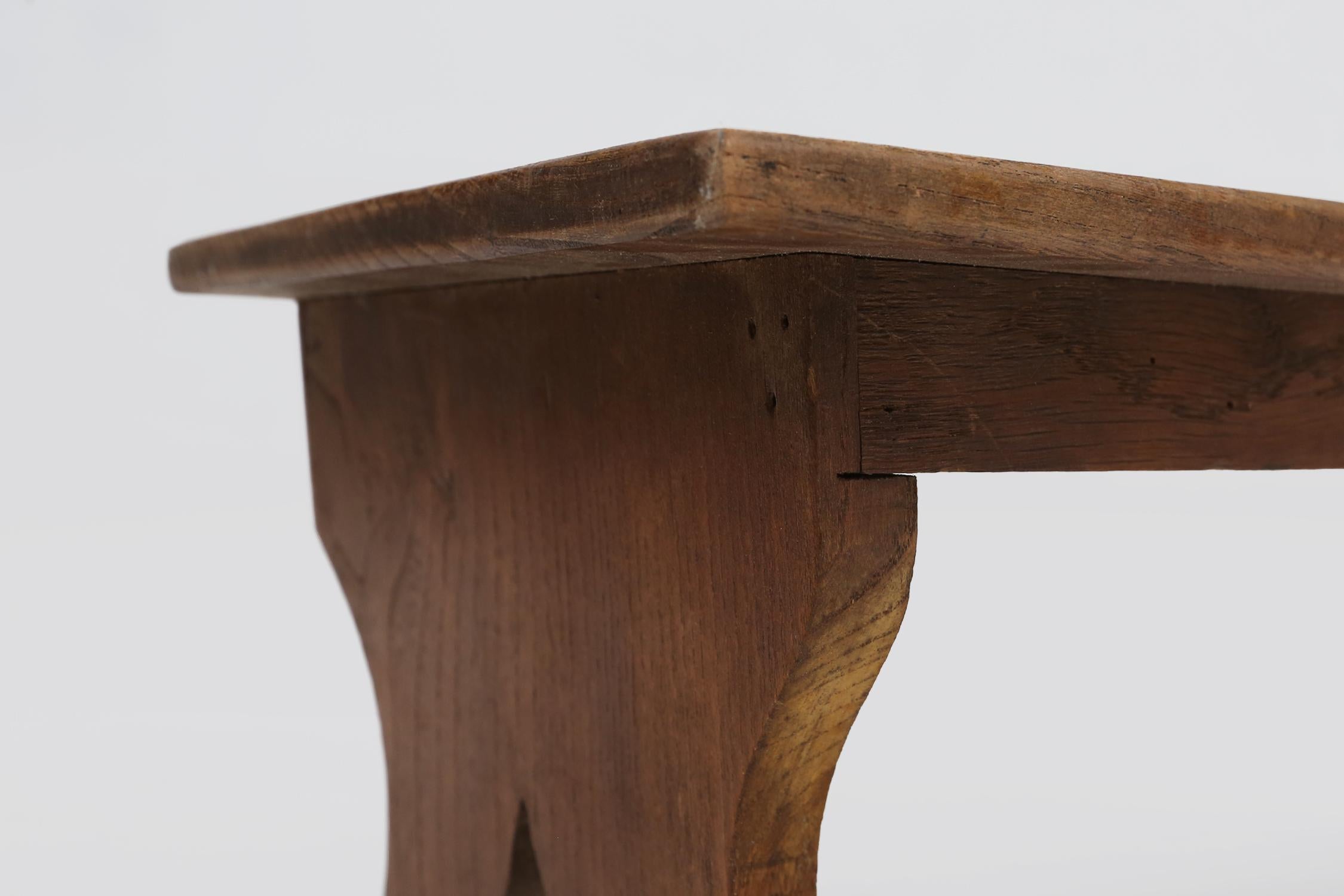 Small rustic wooden stool with curved base, France ca. 1900 For Sale 1