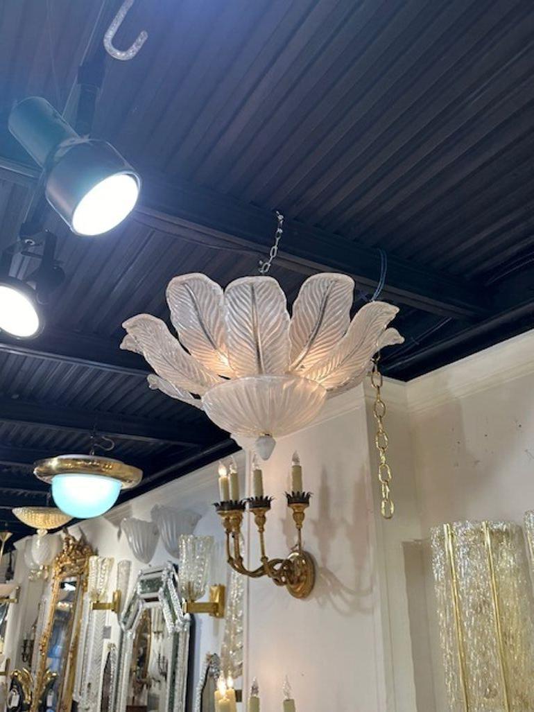 Lovely small scale frosted Murano glass flush mount chandelier in the shape of a flower. Creates a beautiful textural look!!