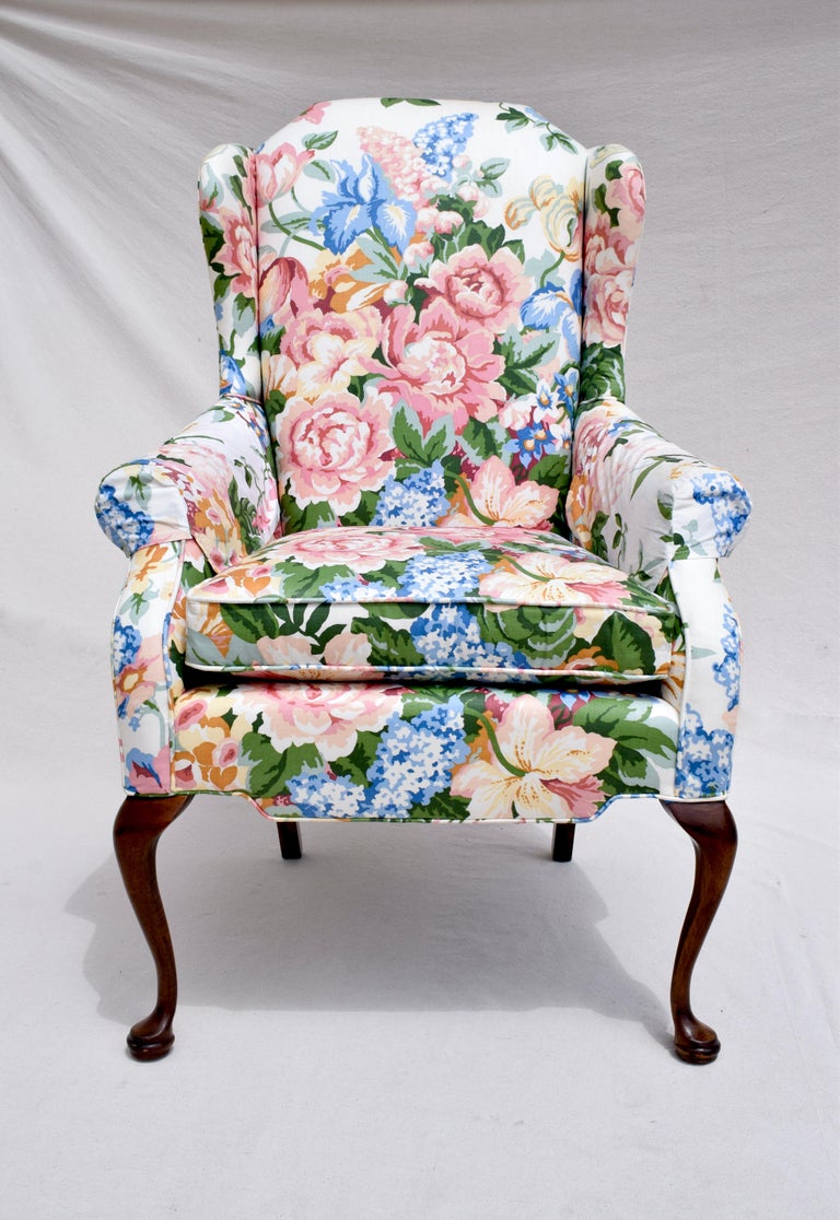A small scale Queen Anne style Chintz Floral upholstered Wingback Chair by Lee Industries. Exquisite lithe lines in excellent vintage condition.