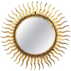 Small Scale Sunburst Mirror in Gilt Wrought Iron