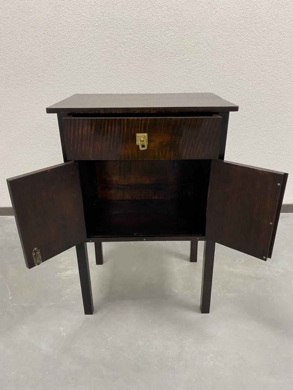 Small secession cabinet with brass fittings. Profesionaly restored and repolished.
