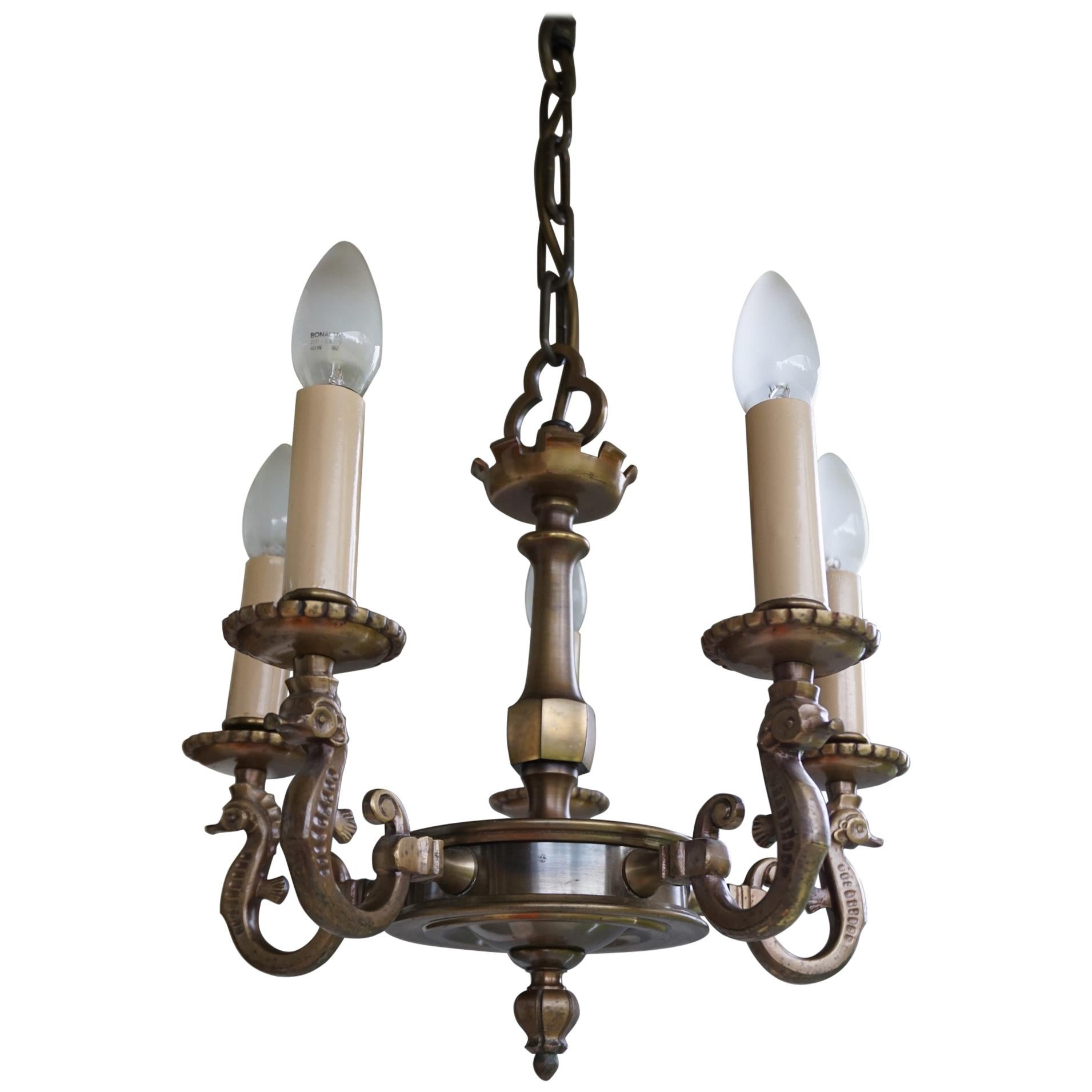 Small Semi 5-Light Pendant with Bronze Seahorse Sculptures and Gothic Stem For Sale