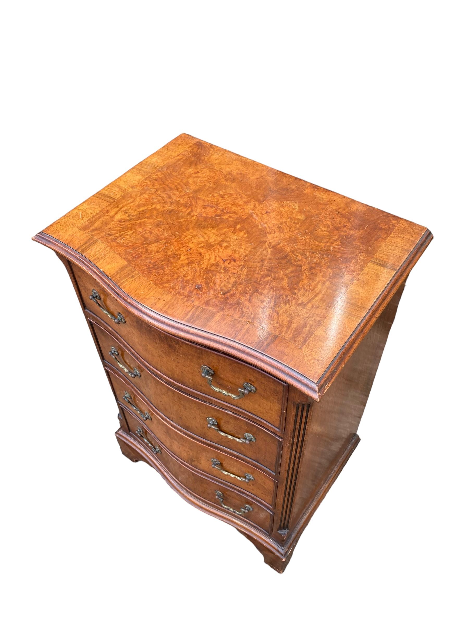 20th Century Small serpentine burr walnut veneered chest of drawers. For Sale