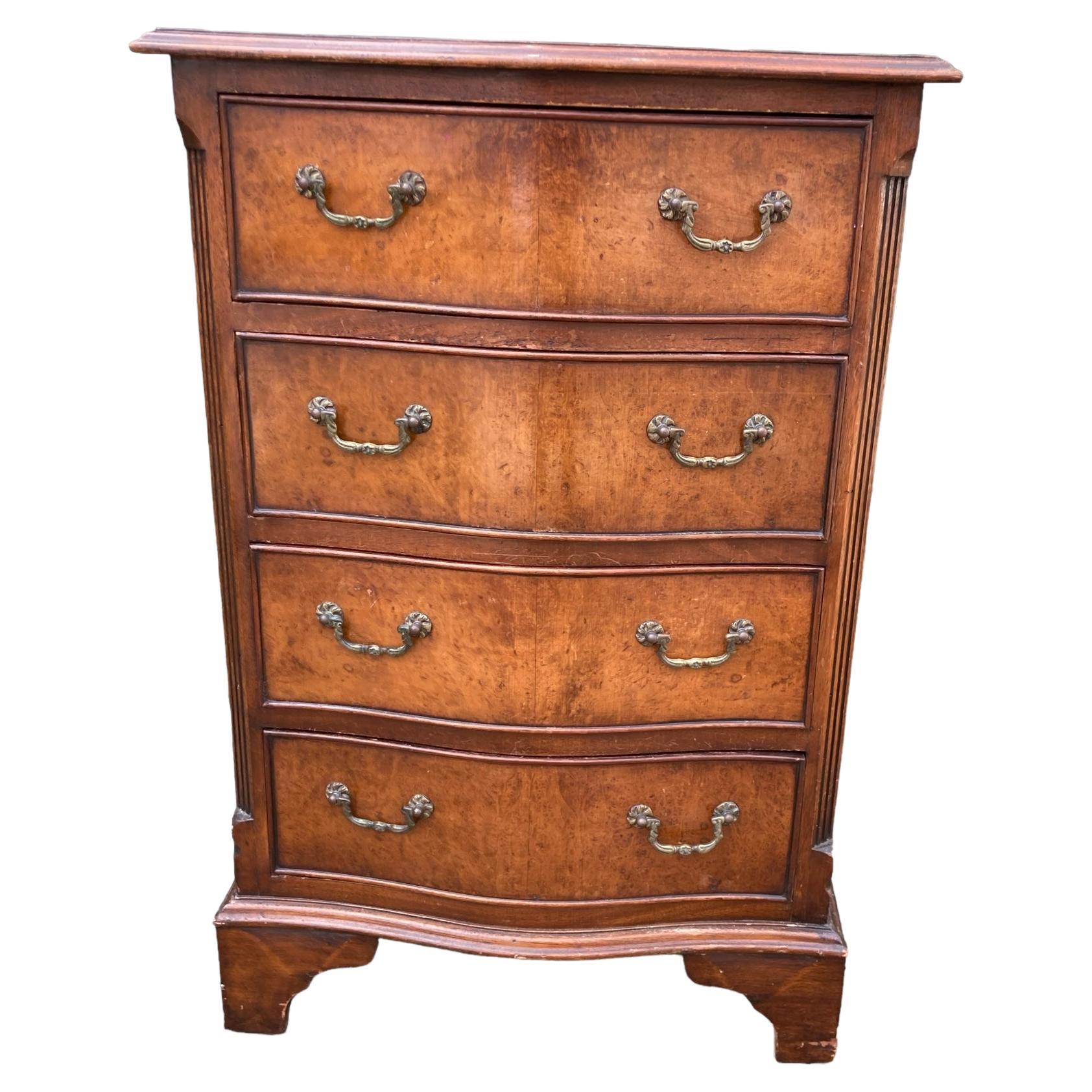 Small serpentine burr walnut veneered chest of drawers. For Sale