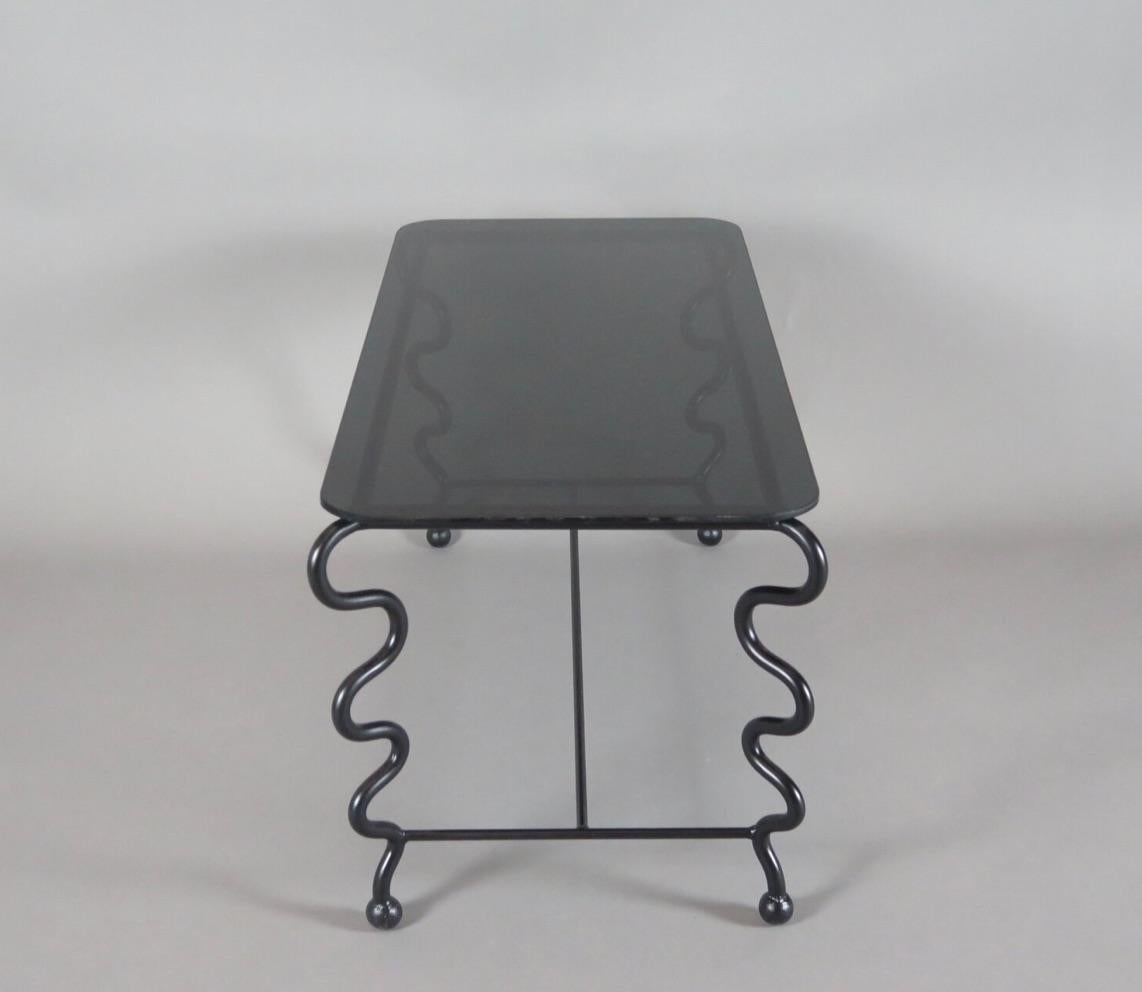 American Small 'Serpentine' Coffee Table with Black Glass Top For Sale