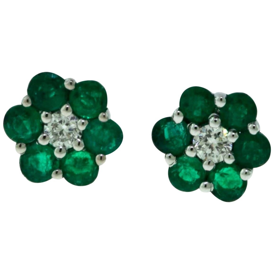 Small Set Emerald and Diamond Center Stone Flower Mini 18 Karat White Gold Studs For Sale