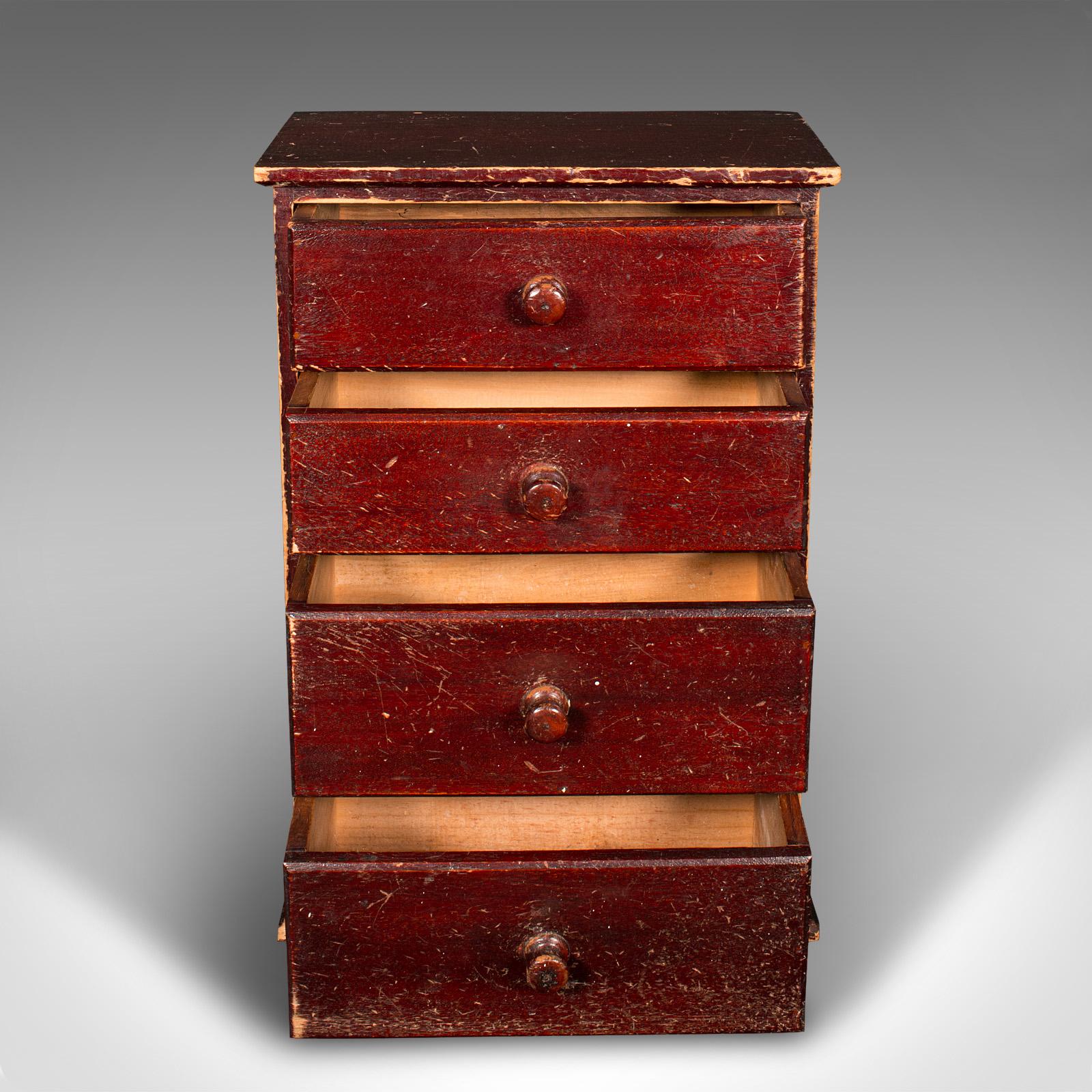 This is a small set of antique apothecary drawers. An English, stained pine countertop chest, dating to the Edwardian period, circa 1910.

Of small stature, ideal for retail merchandise or small collectibles
Displays a desirable aged patina and good
