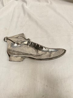 Small "shoe" silvered bronze vide poche