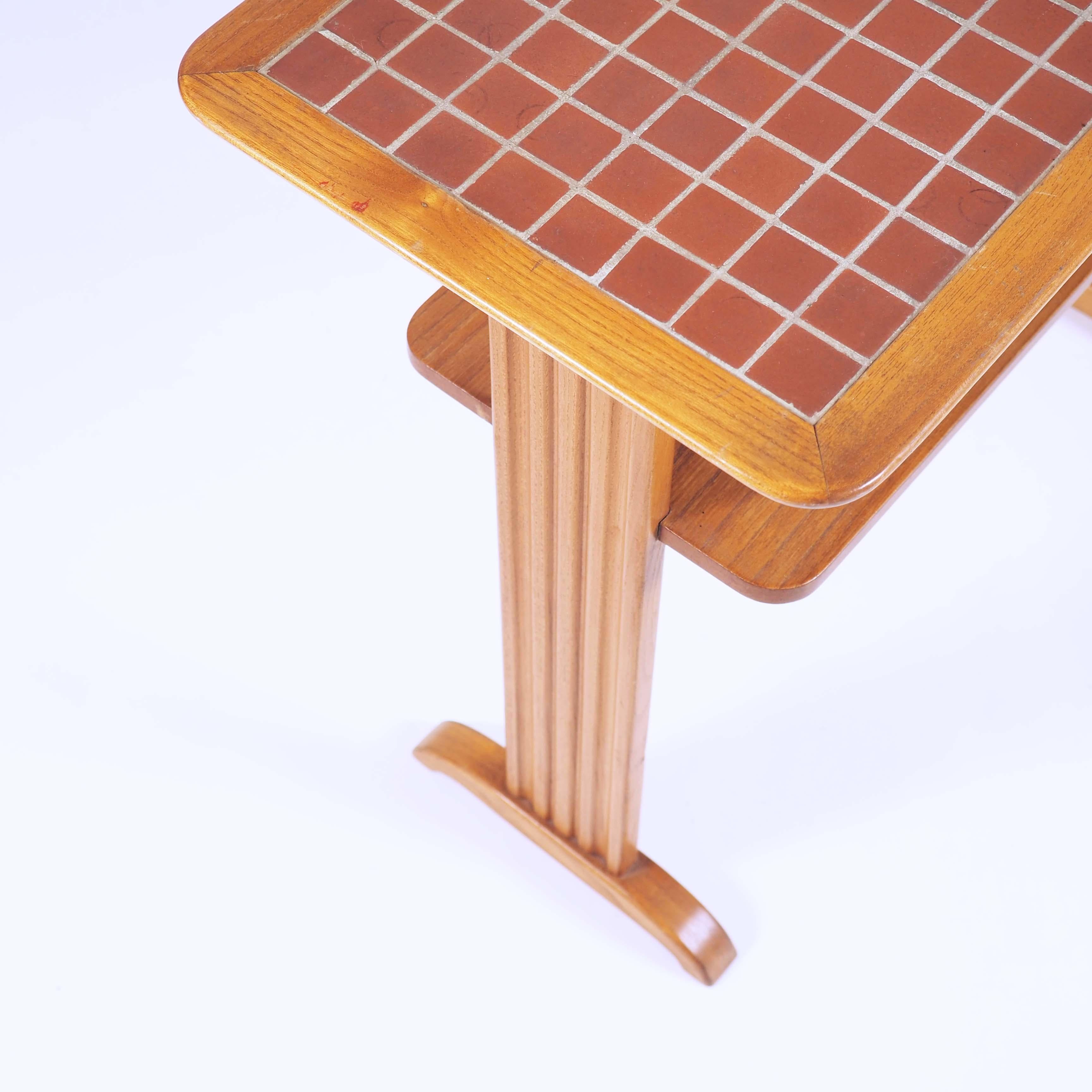 This small table in elmwood and terracotta mosaic (Called 