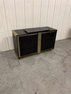 Small sideboard in blackened oak and brass circa 1970