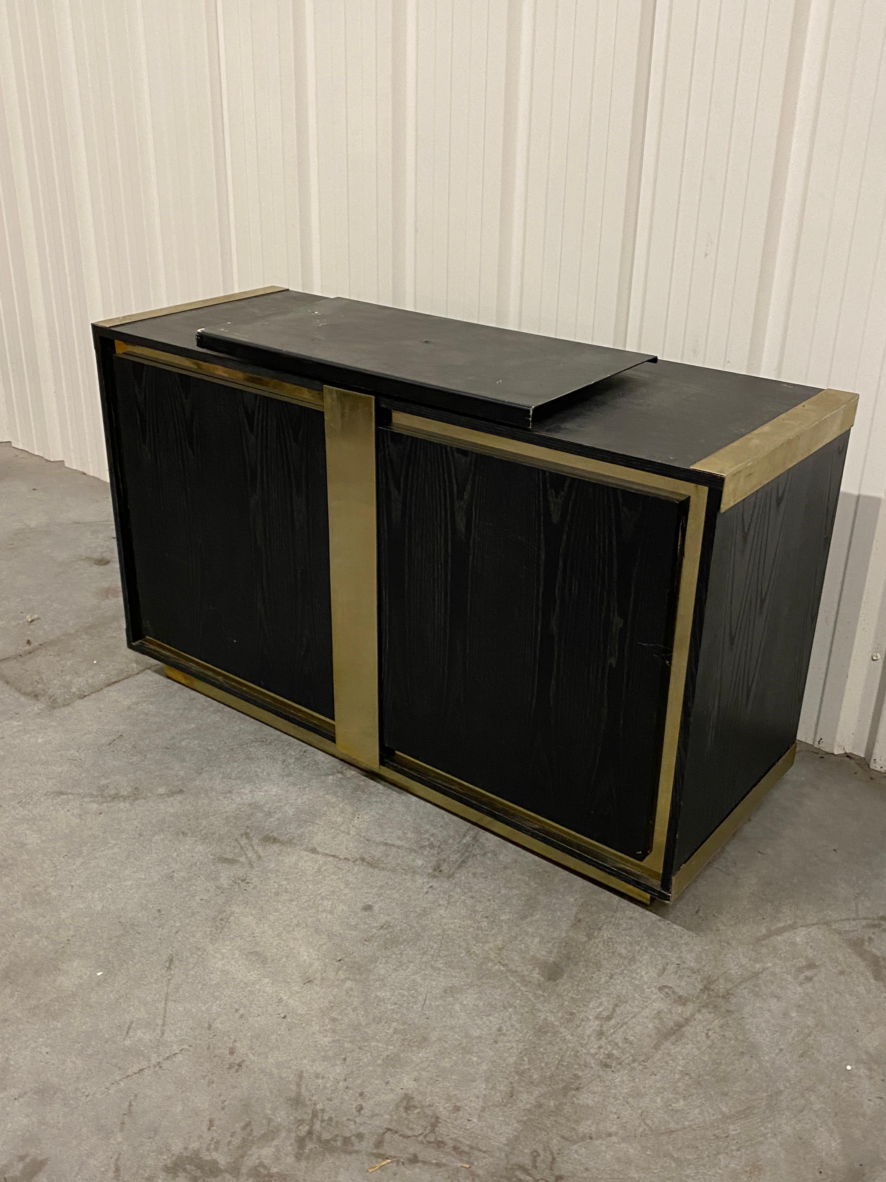 European Small sideboard in blackened oak and brass circa 1970  For Sale