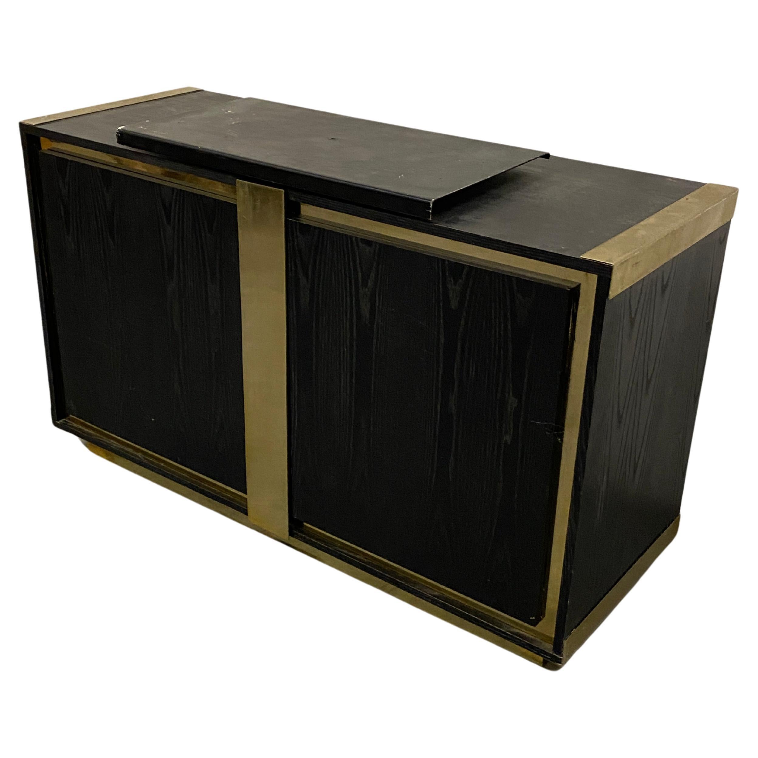 Small sideboard in blackened oak and brass circa 1970  For Sale