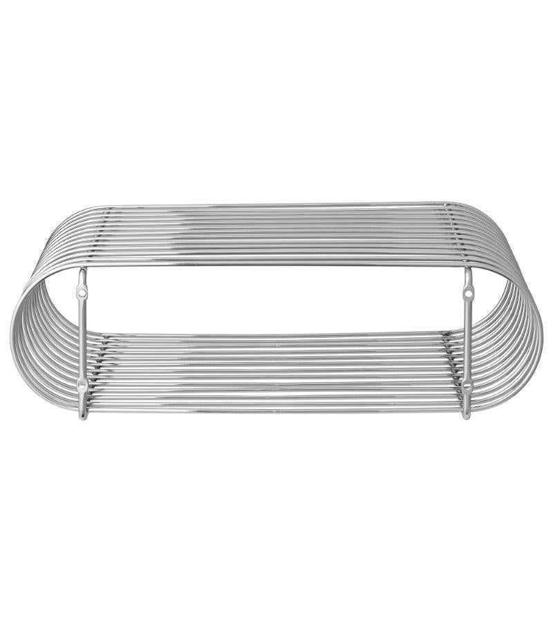 Piccola mensola contemporanea in argento
Dimensioni: L 40,4 x L 25,3 x H 12 cm 
Materiali: Acciaio.
Disponibile anche in nero e oro.


Non è sempre facile determinare cosa fa sì che un design diventi un'icona, ma sembra che la mensola Curva