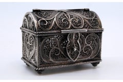 Small silver filigree jewelry box in the shape of a chest w/ clasp & hinged lid