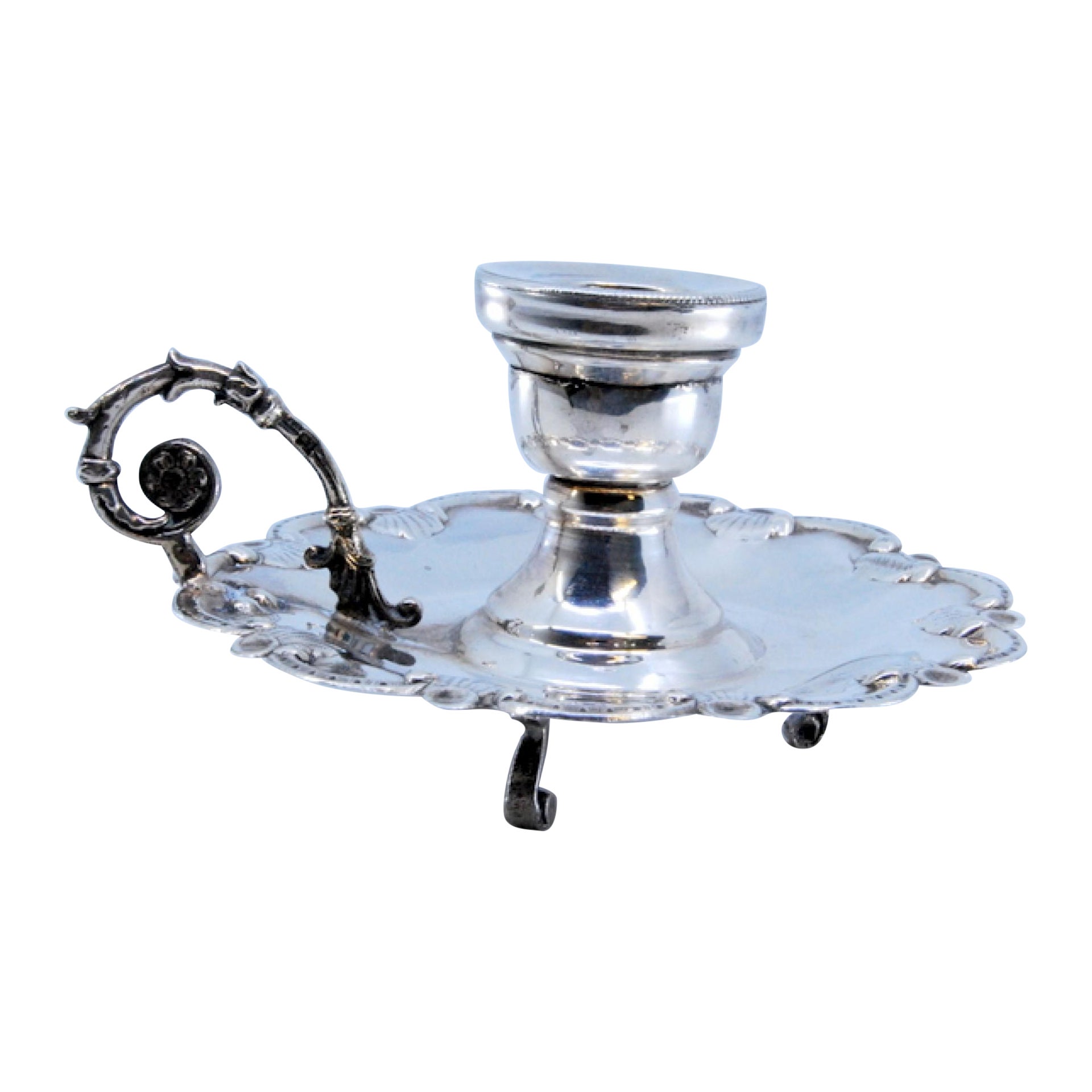 Small silver paddle with a shell-shaped base and resting on three feet For Sale