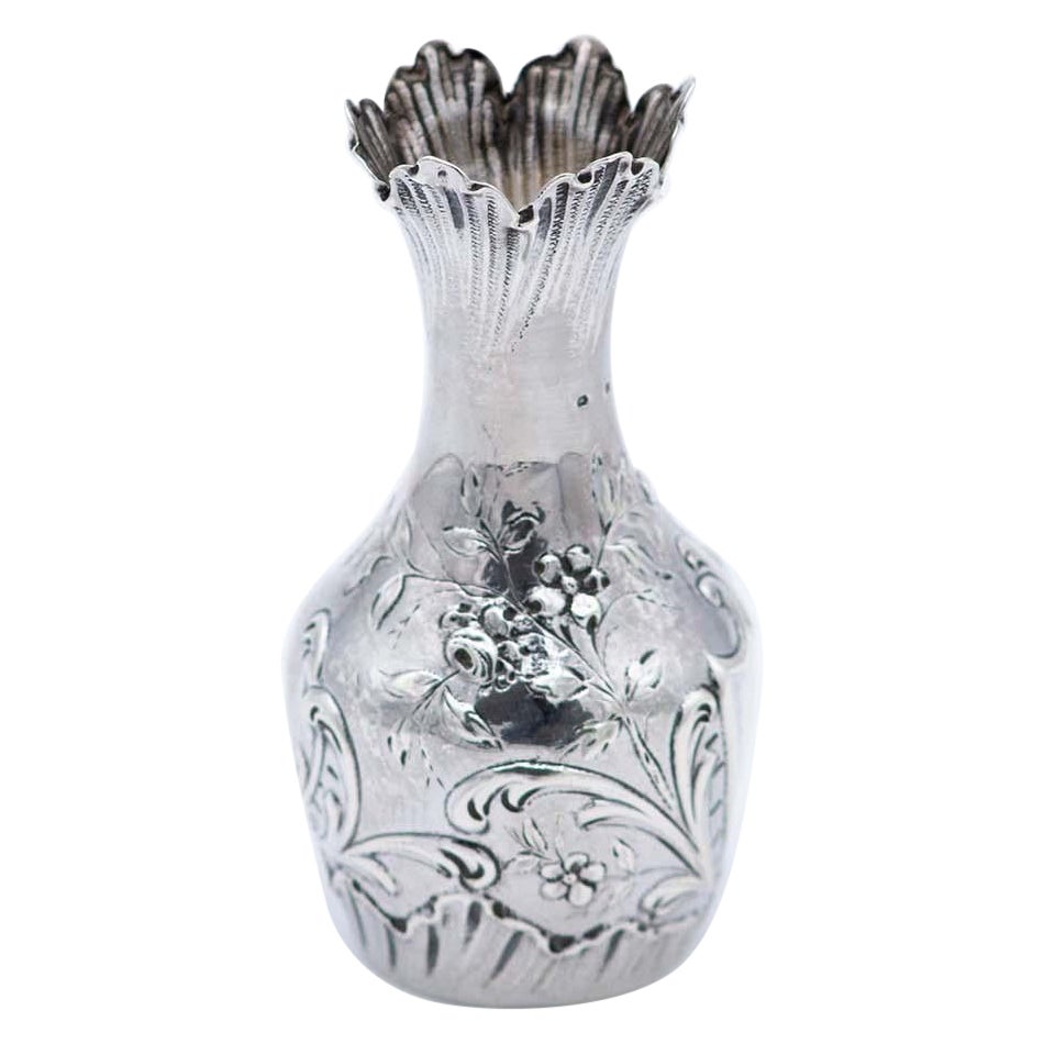 Small silver vase with embossed flowers