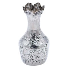 Small silver vase with embossed flowers
