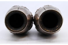 Small silver vases embossed with floral motifs