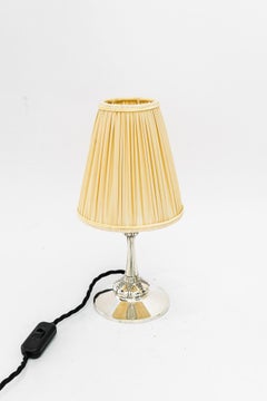Small silvered art deco table lamp with fabric shade vienna around 1920s
