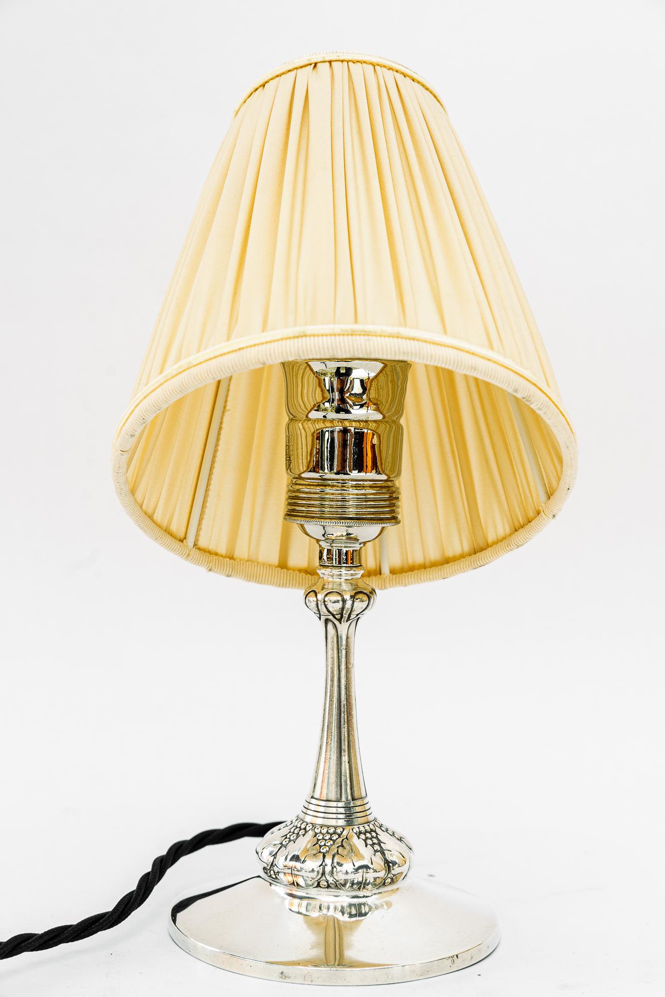 Austrian Small silvered art deco table lamp with fabric shade vienna around 1920s For Sale