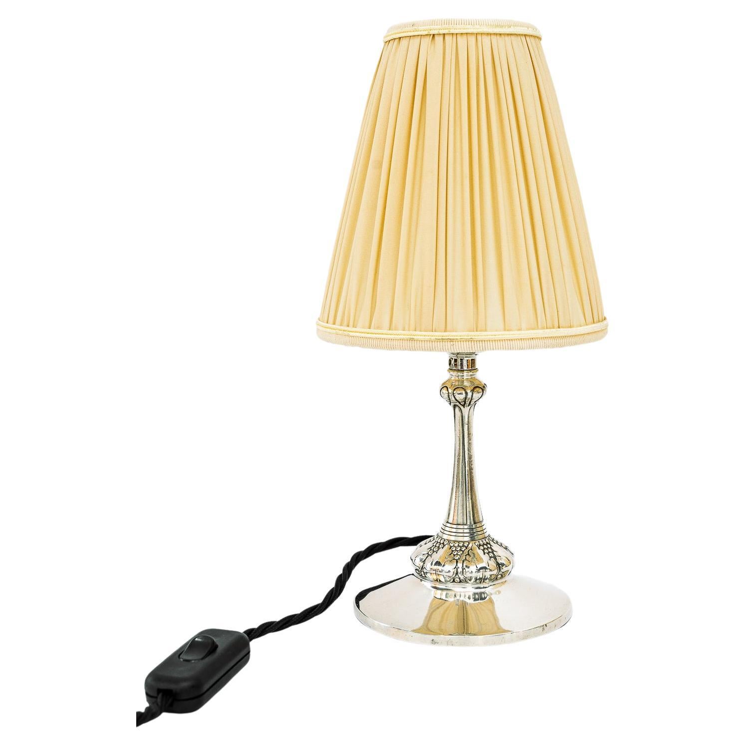 Small silvered art deco table lamp with fabric shade vienna around 1920s For Sale