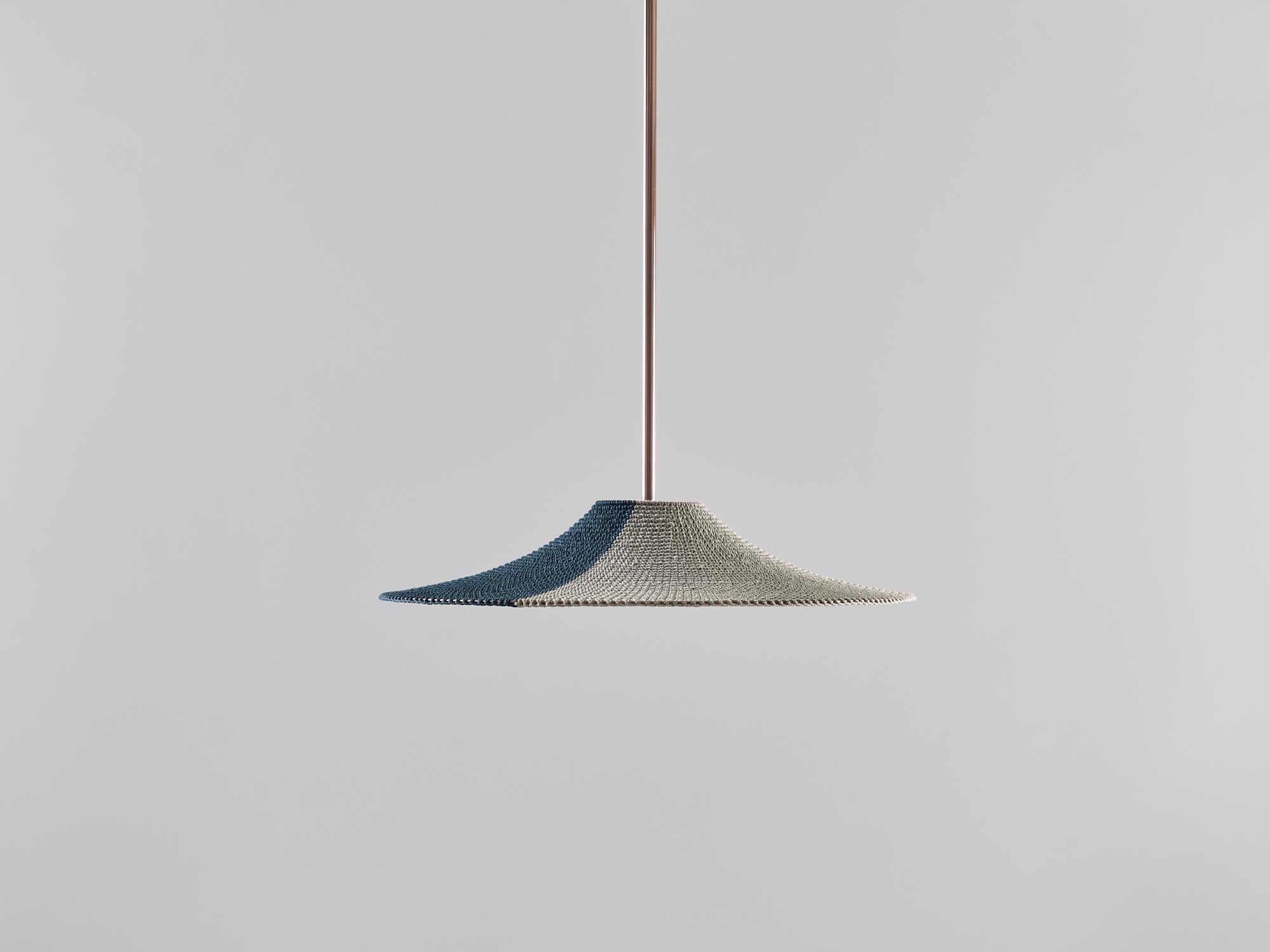 Small simple shade 01 50/50 pendant lamp by Naomi Paul.
Dimensions: D 50 x H 8 cm.
Materials: metal frame, Egyptian cotton cord.
Colors: Deepsea and Putty.
Available in other colors and in 3 sizes: D50, D60, D80 cm.
Available in plain, 50/50,