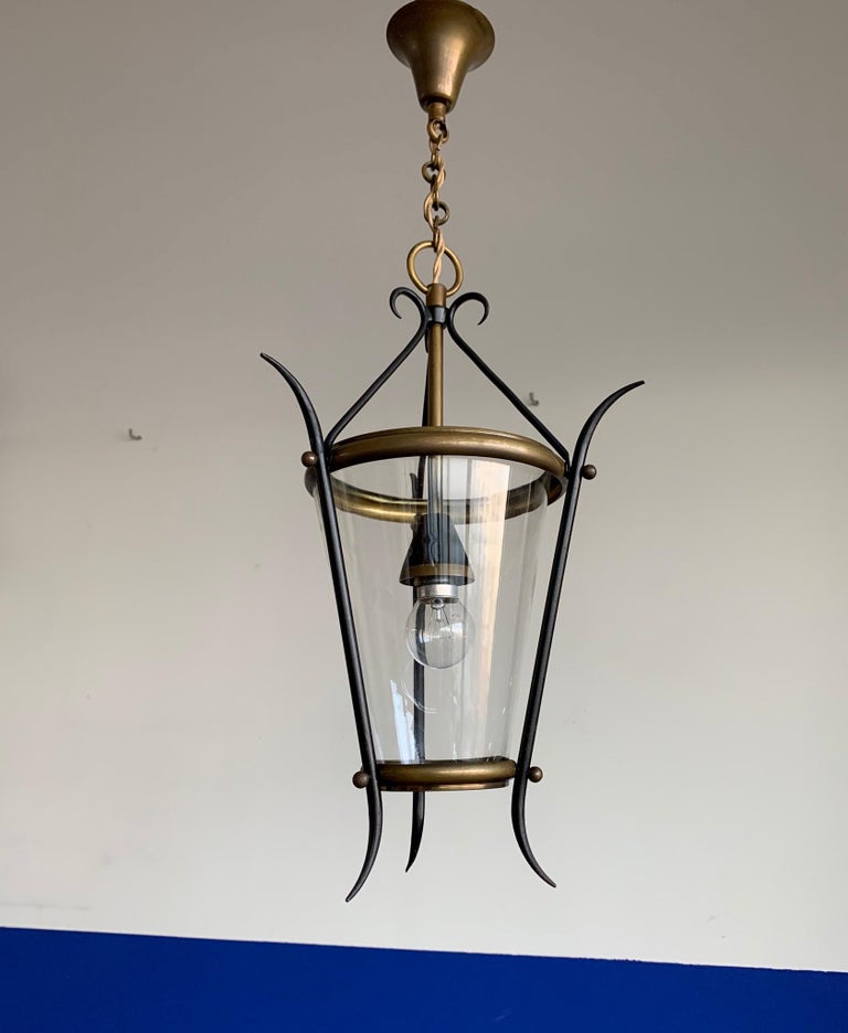 Wonderfully stylish and elegant, midcentury light fixture.

If you are looking for a rare and voguish fixture to grace your home then this handcrafted midcentury light could be your perfect lighting solution. One of our specialties is early 20th
