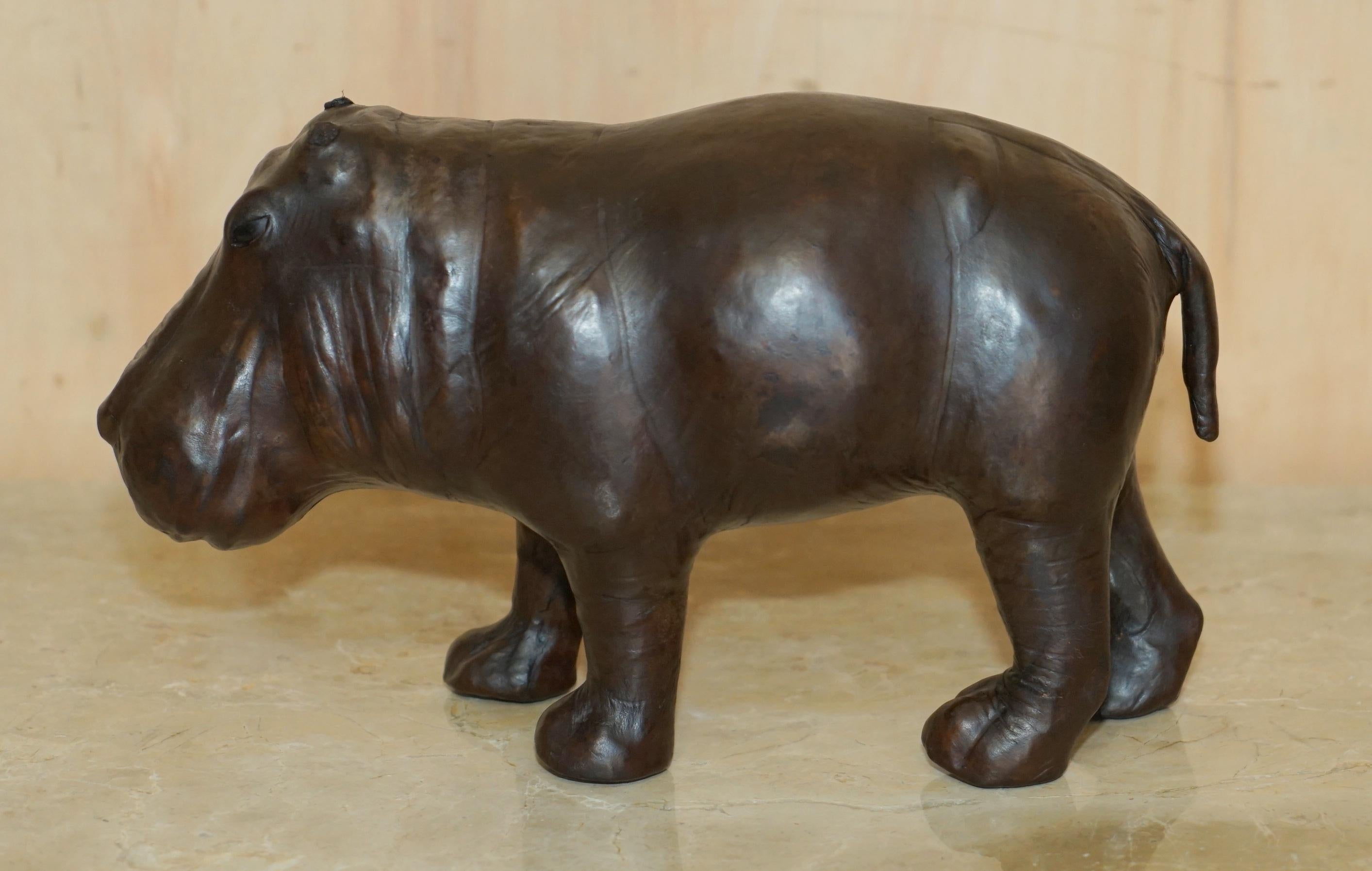 Royal House Antiques

Royal House Antiques is delighted to offer for sale this absolutely sublime very rare and original, small sized 1930’s Liberty’s London Omersa brown leather hand dyed Hippo stool or footstool with original glass eyes

I have a