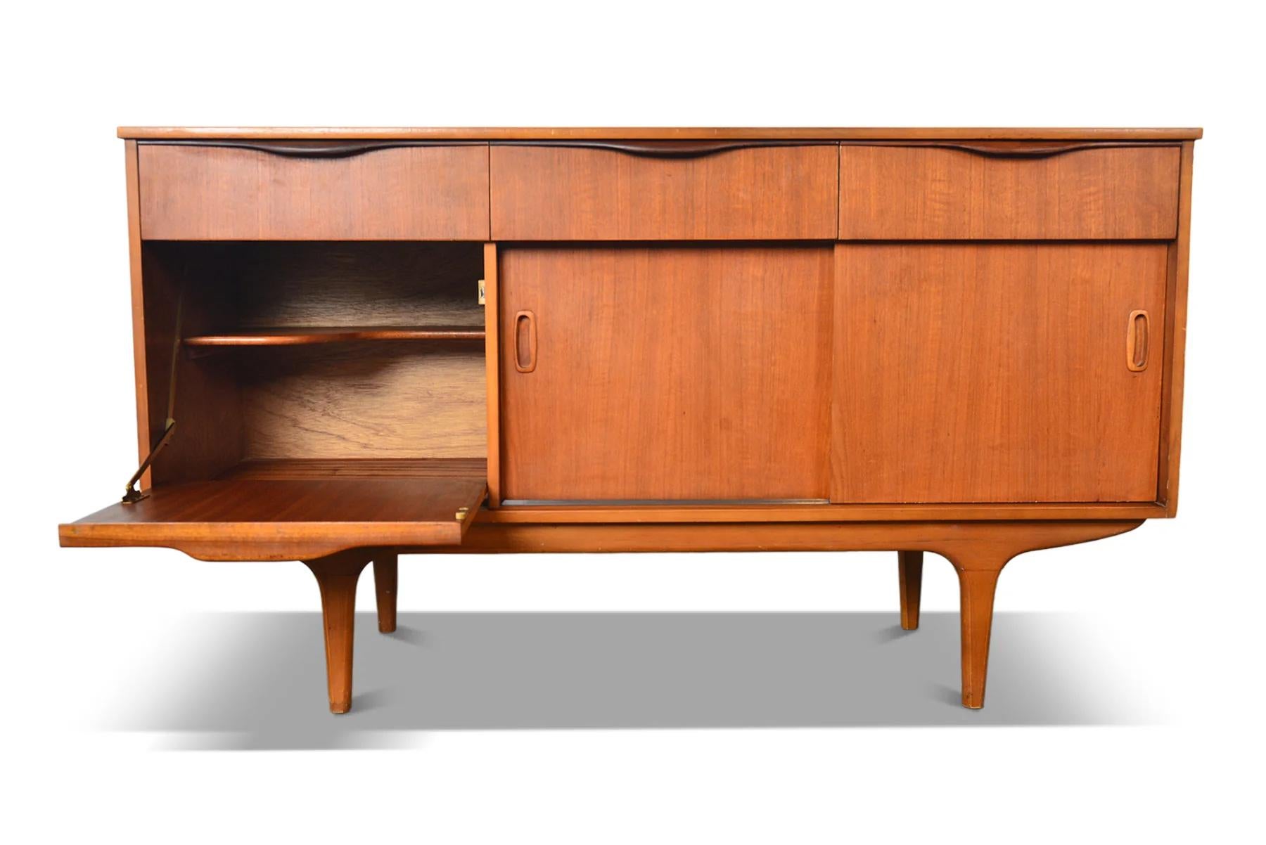 Origin: England
Designer: Unknown
Manufacturer: Unknown
Era: 1960s
Materials: Teak
Measurements: 54