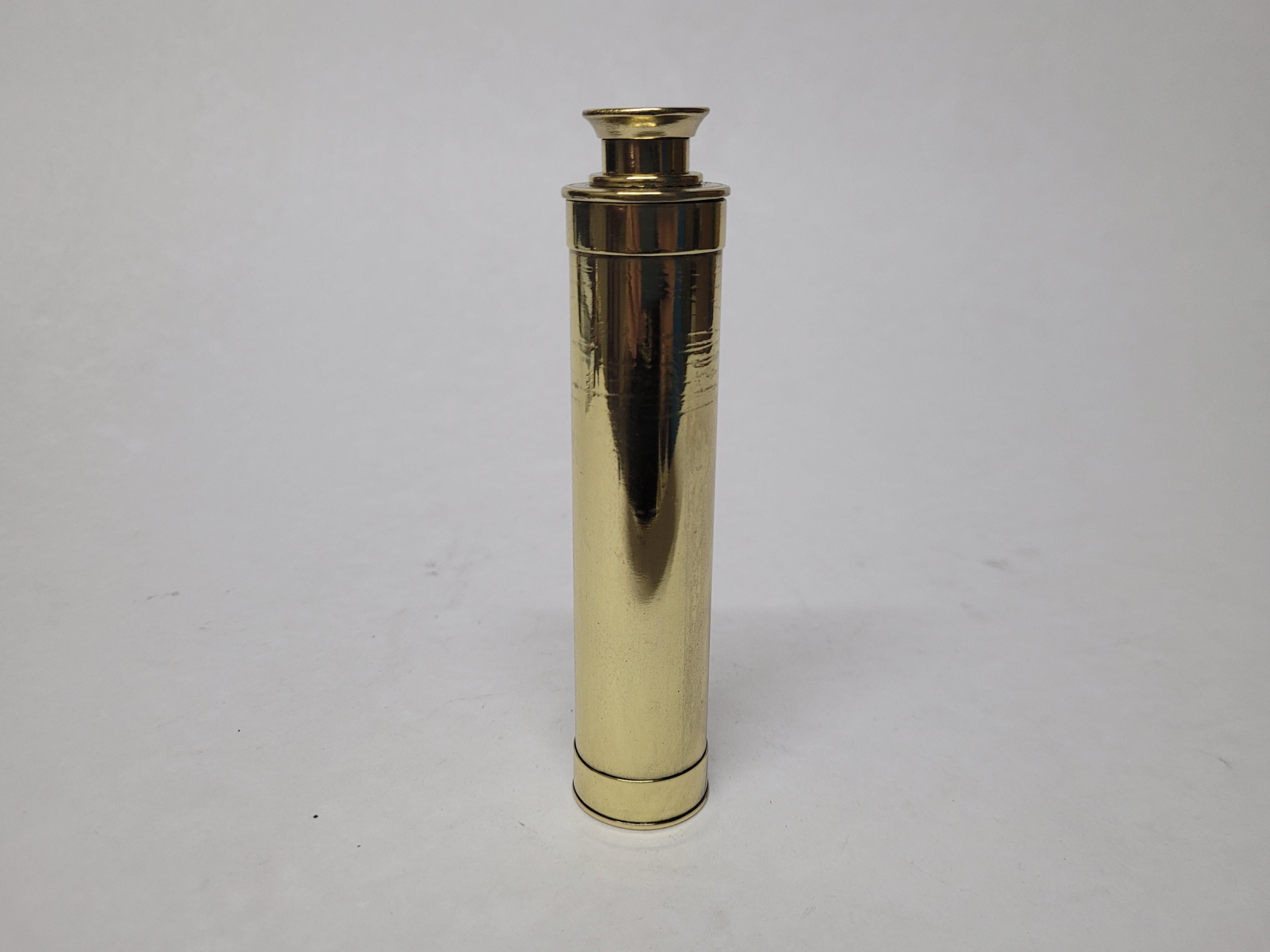 Tiny Ships spyglass telescope appropriate for use on a yacht, ship, or anywhere with a view. This has been meticulously polished and lacquered. We just restored a great collection of these. This fine instrument has a single draw barrel of solid