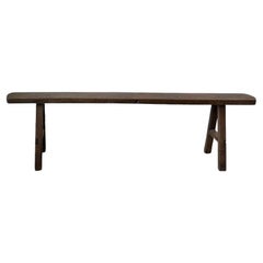 Small solid walnut artisanal farm bench, 1950s
