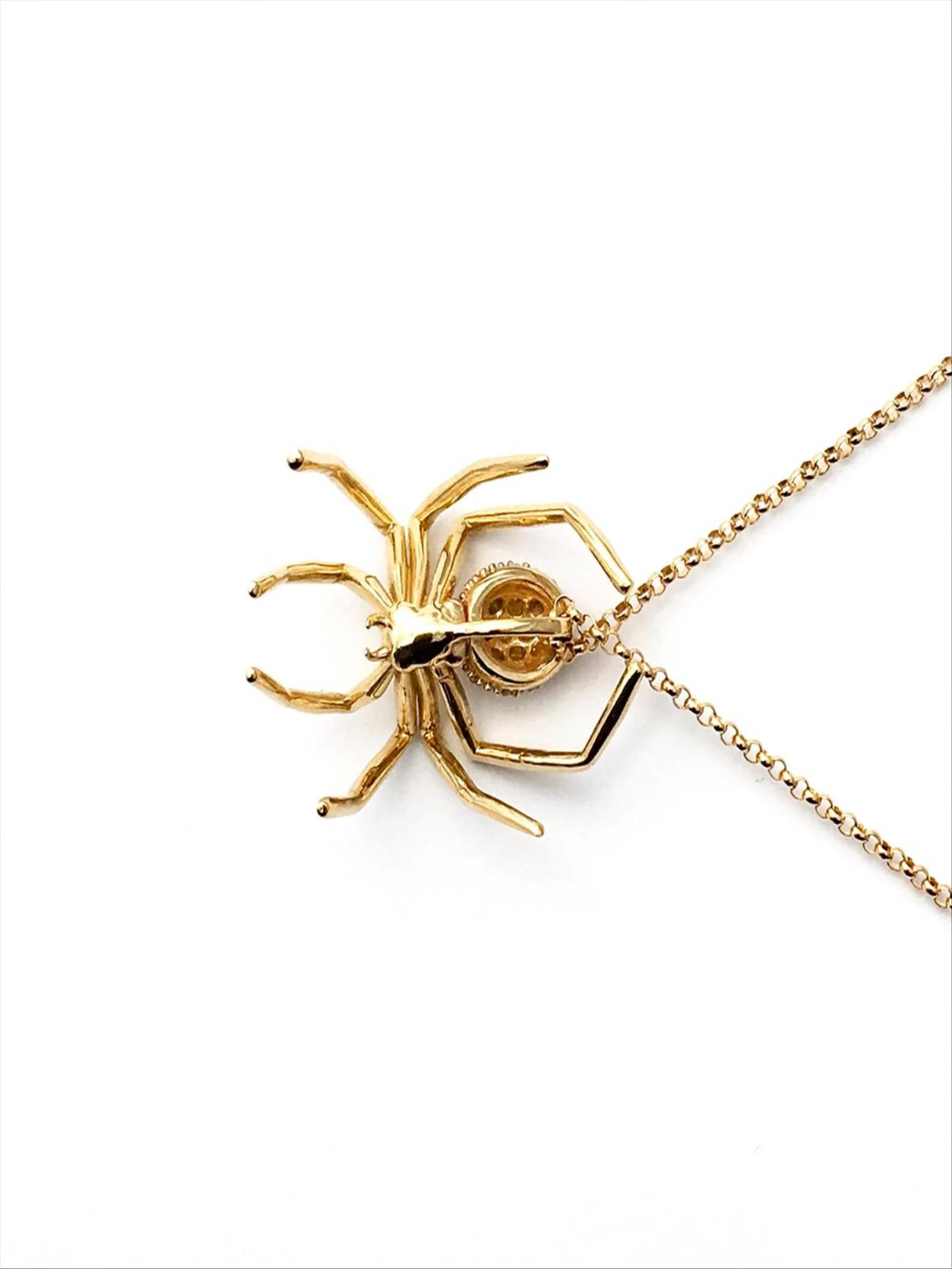 Introducing this Spider Pendant Yellow Gold Plated White Sapphires  - a piece of jewelry that will add a touch of intrigue and elegance to any outfit. Crafted with the finest materials, this pendant is a true work of art.

At first glance, the