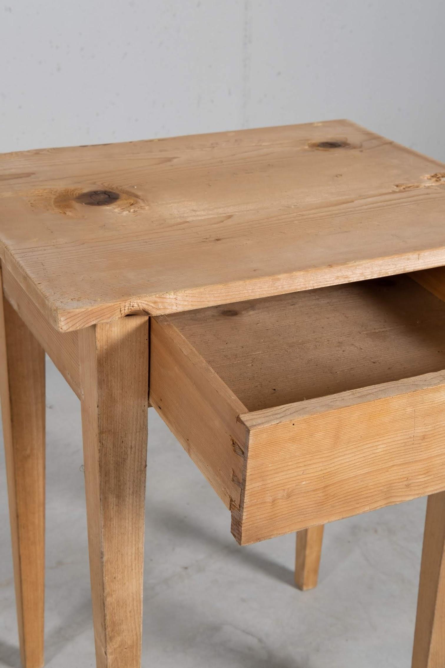 Simple yet rich in details small spruce table.