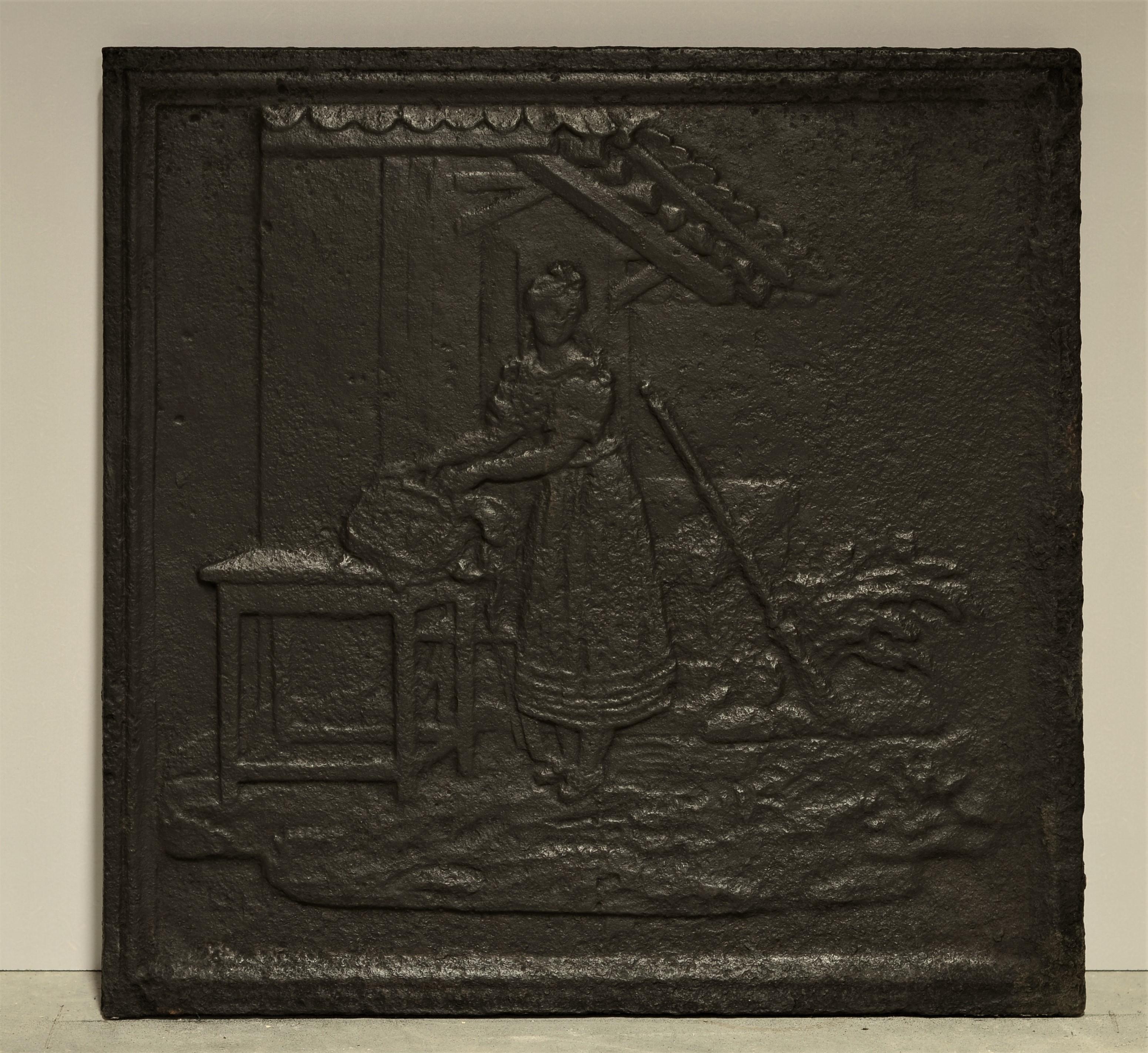 Jolie plaque de cheminée en fonte carrée et décorative représentant une femme en train de faire la lessive et d'autres tâches ménagères.

Excellent état d'origine et belle patine.
Peut être placé dans un vrai feu utilisé comme dosseret.

Vendu par
